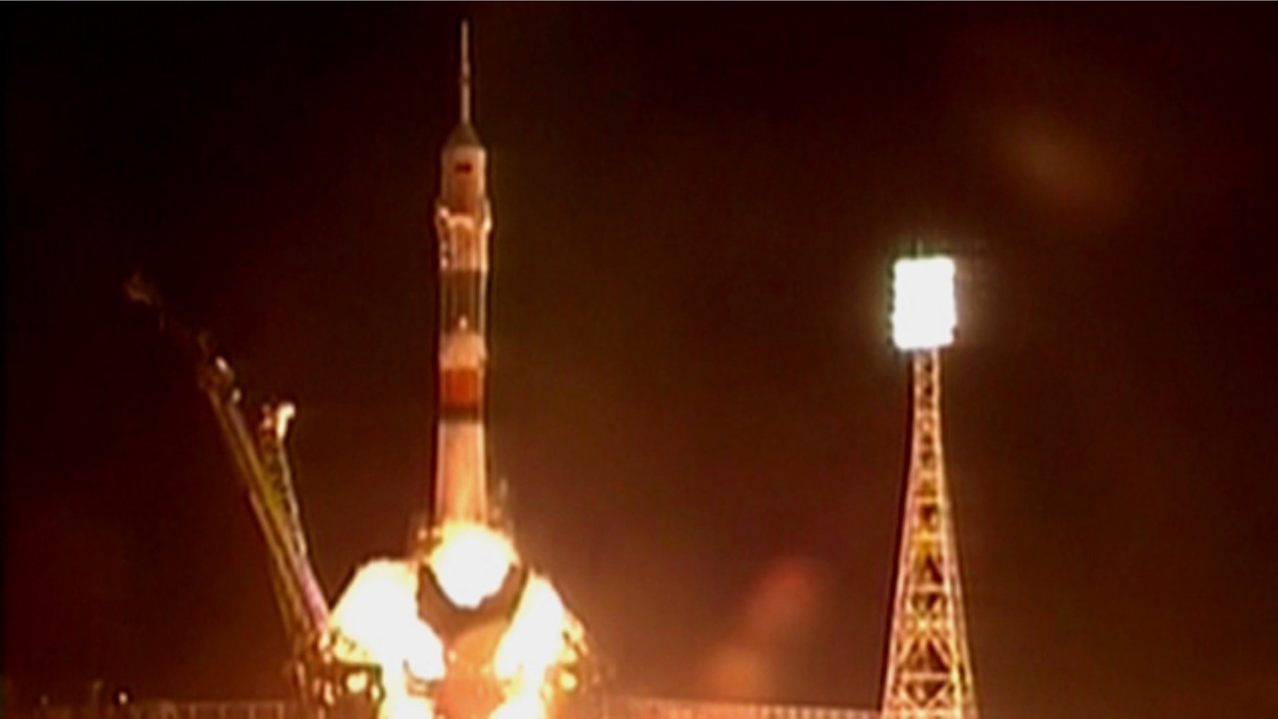 The new Soyuz TMA-01M blasts off with a crew of three astronauts from the Baikonur Cosmodrome in Kazakhstan at 7:10 p.m. EDT (2310 GMT) on Oct. 7, 2010.