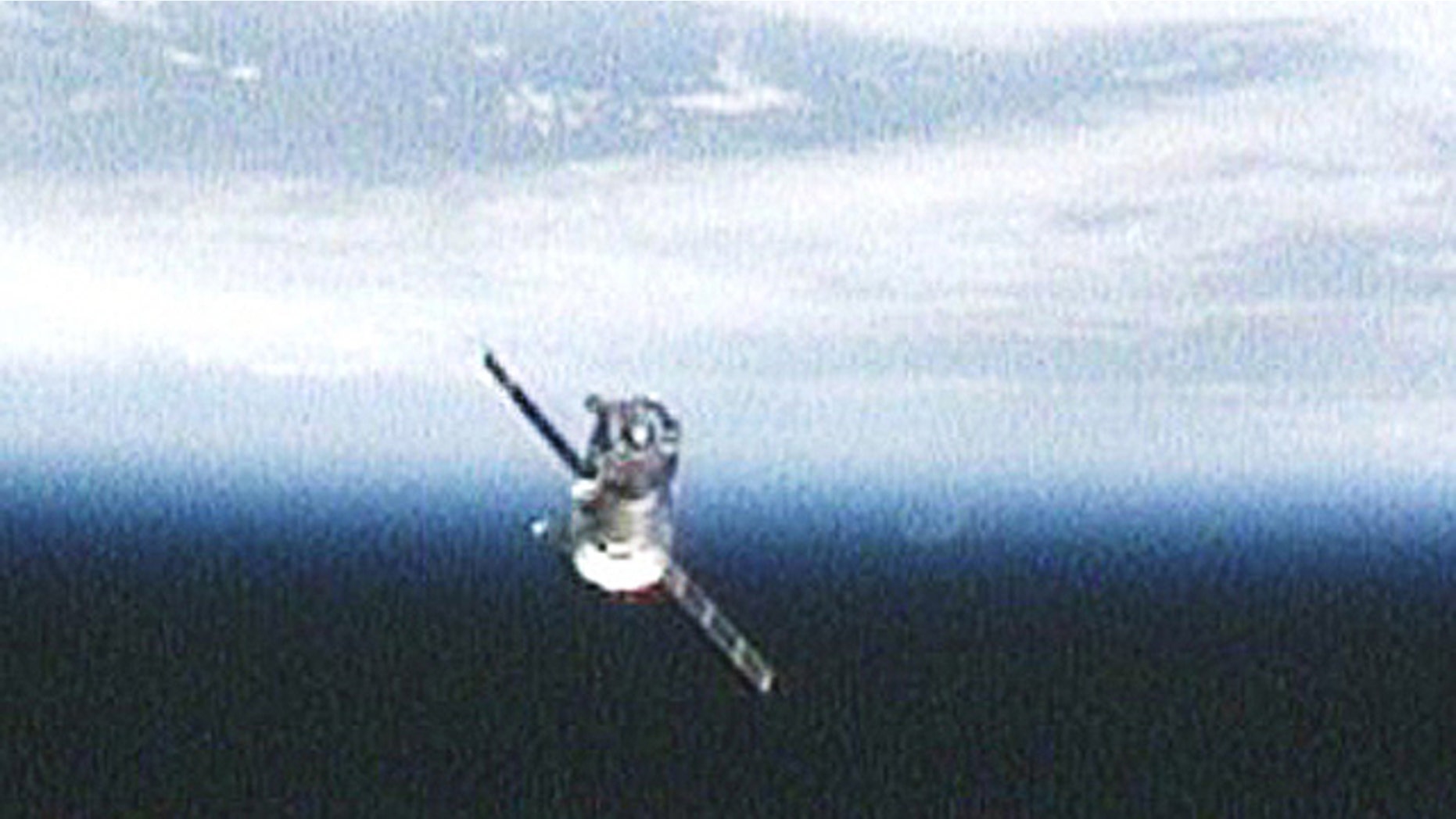 The Soyuz TMA-17 spacecraft carrying Expedition 23 Commander Oleg Kotov and Flight Engineers T.J. Creamer and Soichi Noguchi moves away from the International Space Station after undocking on June 1, 2010 in this view from an exterior station camera.