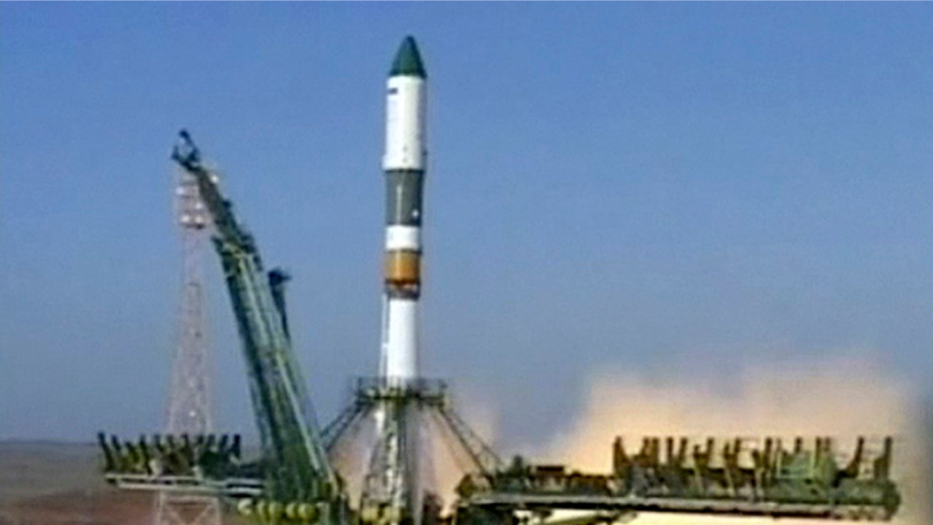 a Soyuz rocket booster carrying Progress supply ship is launched from the Baikonur cosmodrome in Kazakhstan, Wednesday, Aug. 24, 2011.