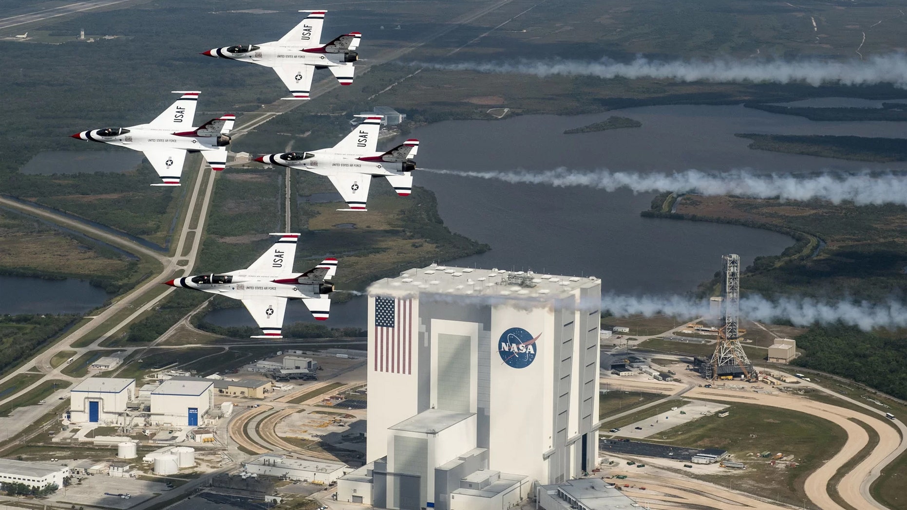 President Donald Trump wants a new Space Force branch of the U.S. military, but it reopens an old argument about military uses in space. Here, the U.S. Air Force Thunderbirds fly over NASA's Kennedy Space Center in Florida with retired NASA astronaut and Air Force Col. Buzz Aldrin. Credit: U.S. Air Force photo/Tech. Sgt. Christopher Boitz