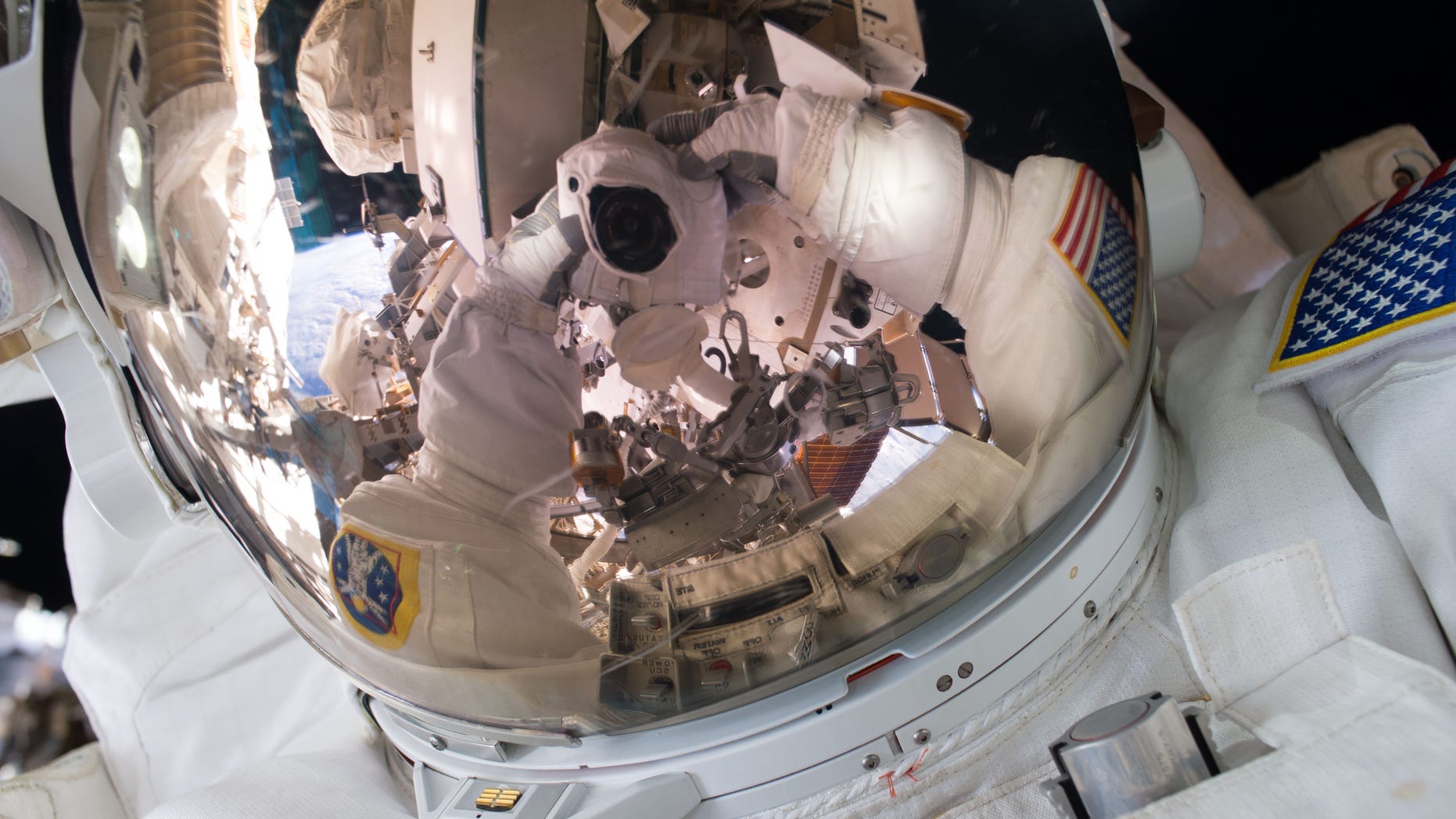 (NASA –Astronaut Scott Kelly takes a selfie during a spacewalk on October 28, 2015)