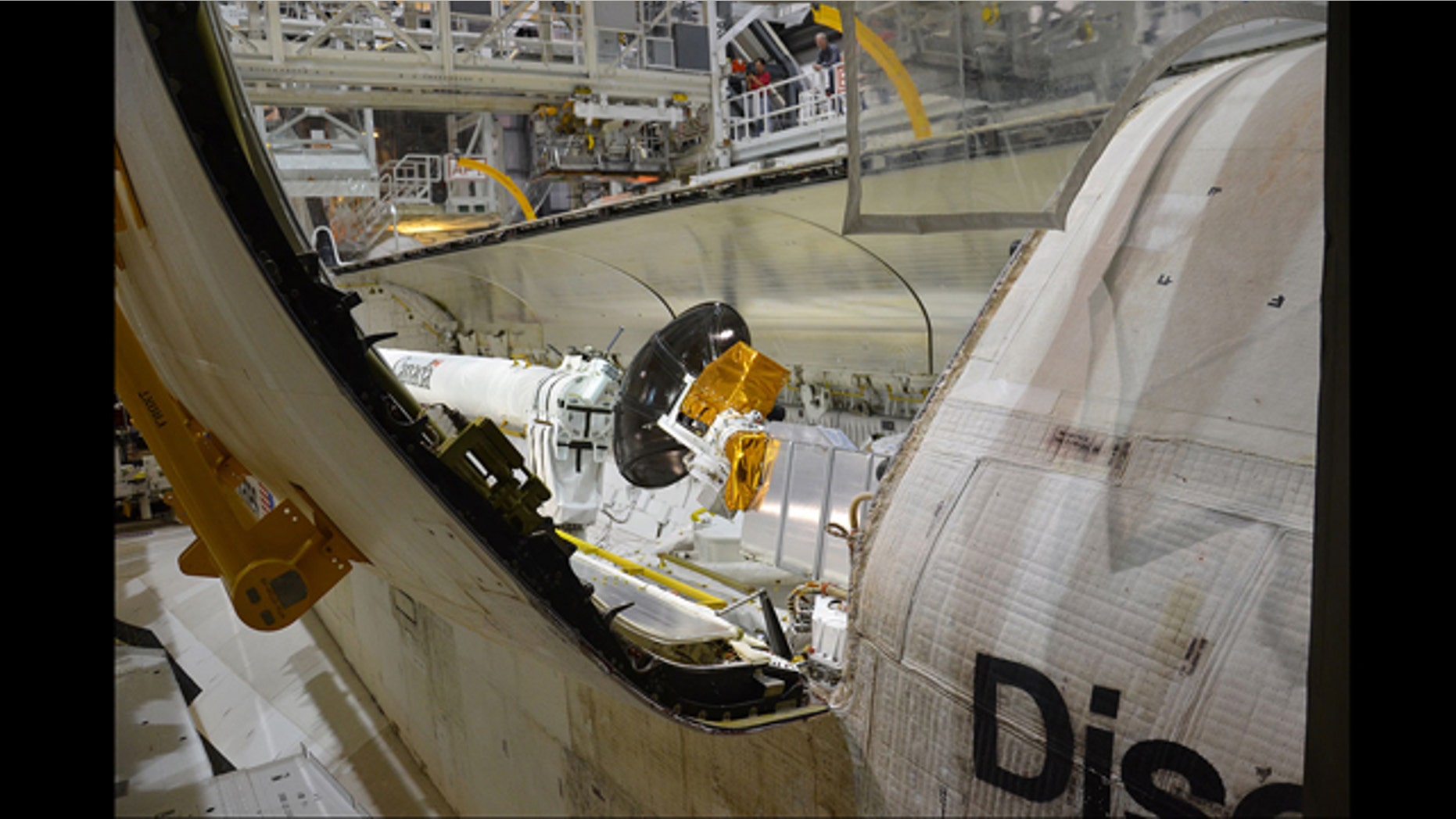 Dec. 16, 2011: Space shuttle Discovery's twin, 60-foot payload bay doors were closed for a final time at NASA's Kennedy Space Center in Florida.