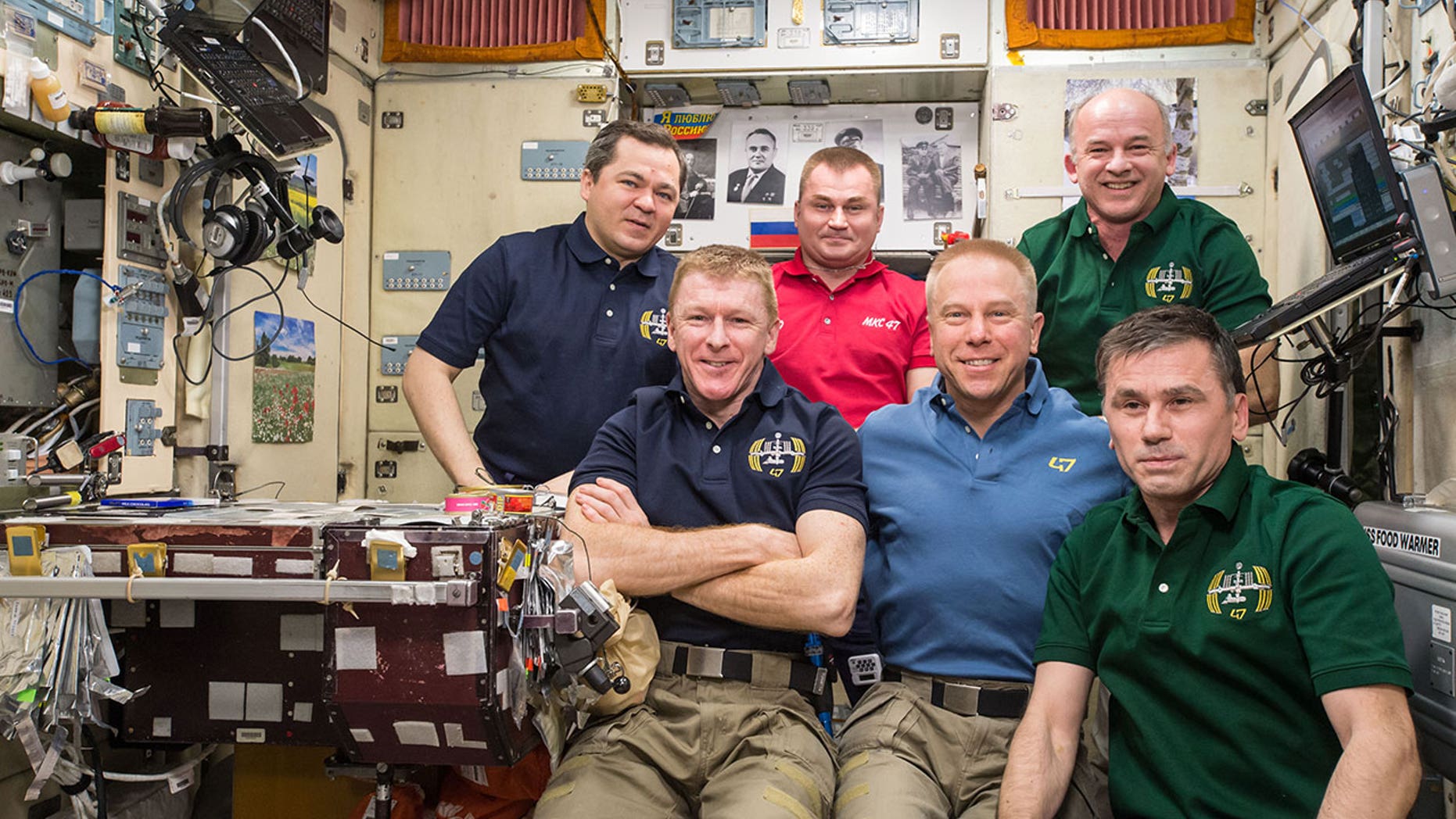 The Expedition 47 crew poses for the three millionth image taken aboard the International Space Station on April 30, 2016.