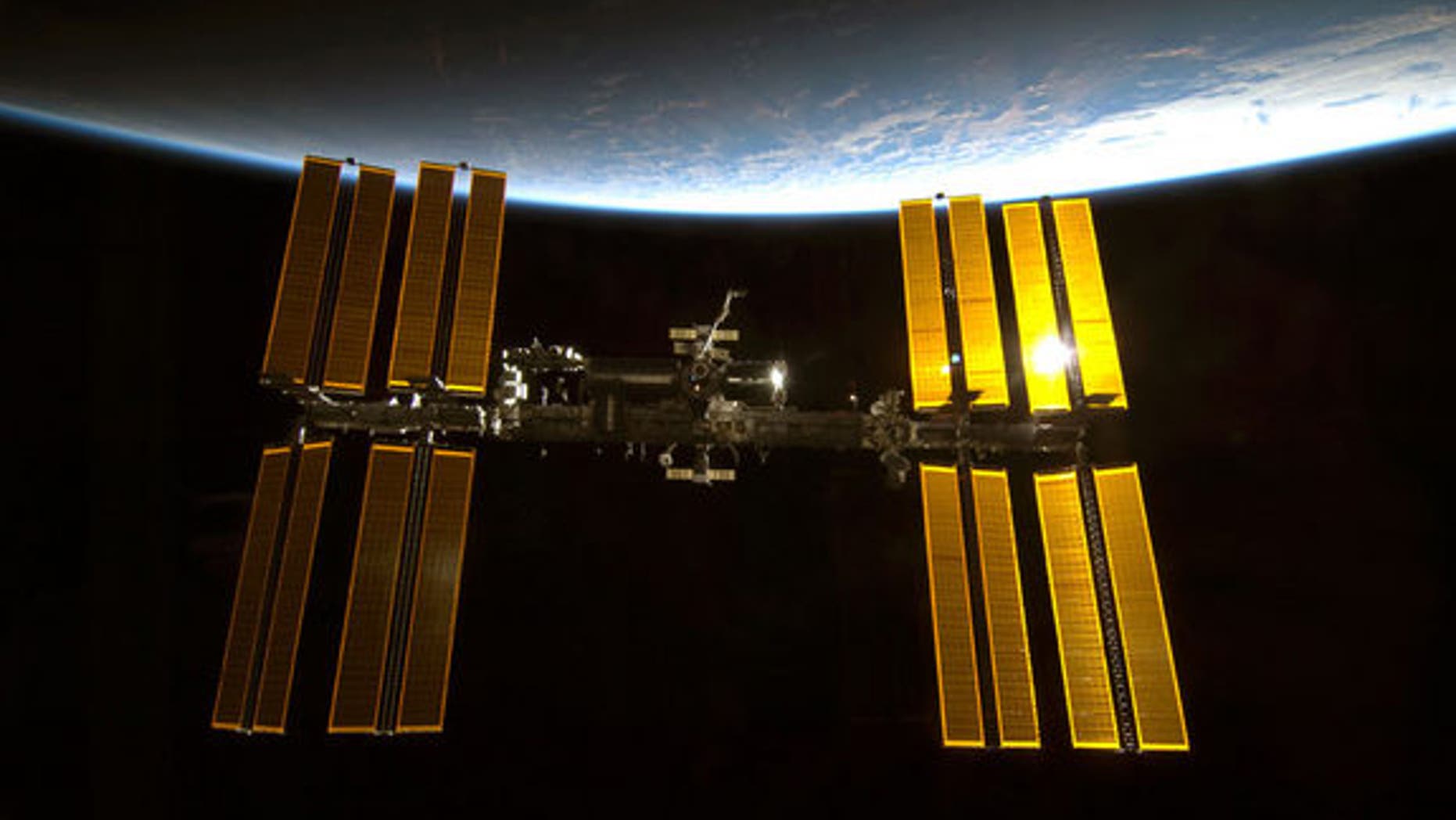 This image from a NASA space shuttle mission shows the International Space Station in orbit. The space station is the size of a football field and home to six astronauts. Image taken: Feb. 10, 2010.