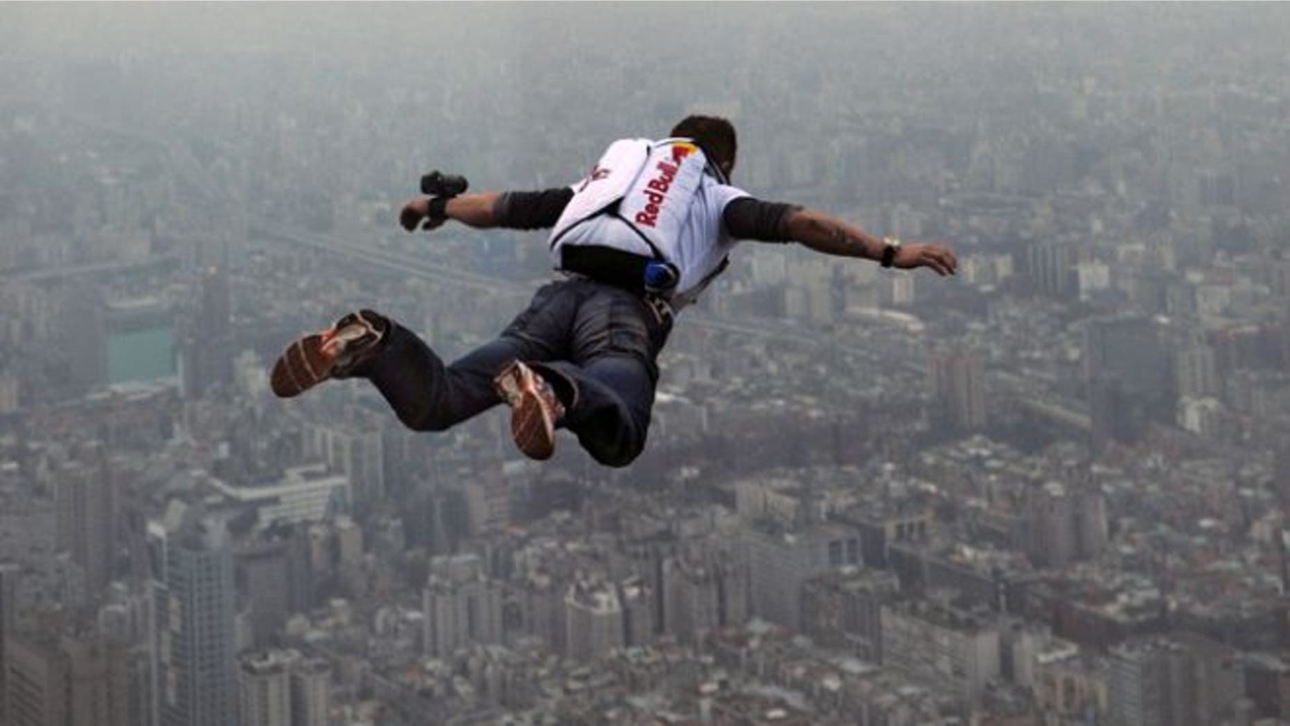38-year-old Felix Baumgartnerof Austria leaps off the world as tallest completed building, the 508-meter high Taipei 101 Towera in Taiwan.
