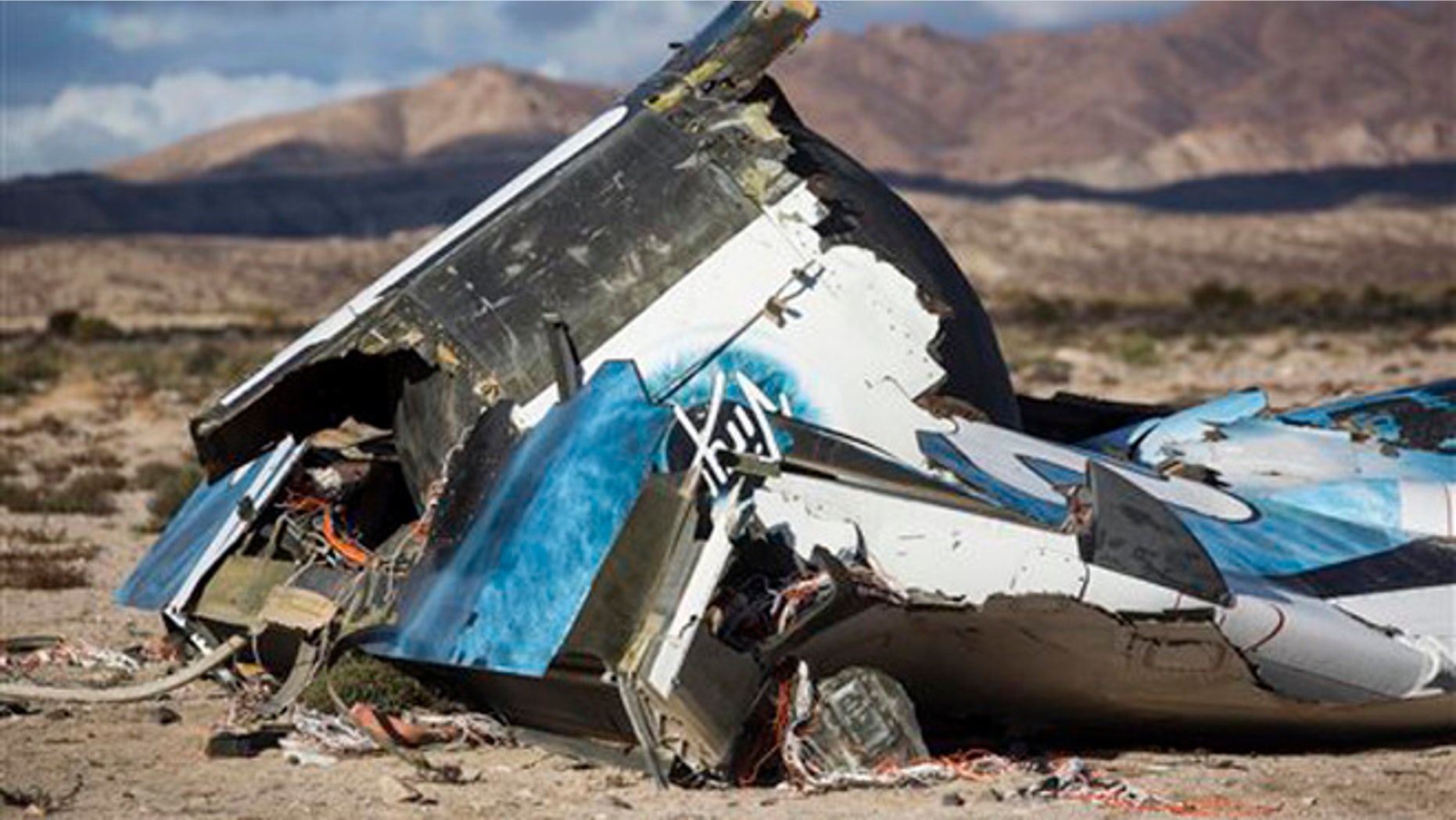 Nov. 1, 2014: In this file photo, wreckage lies near the site where a Virgin Galactic space tourism rocket, SpaceShipTwo, exploded and crashed in Mojave, Calif.