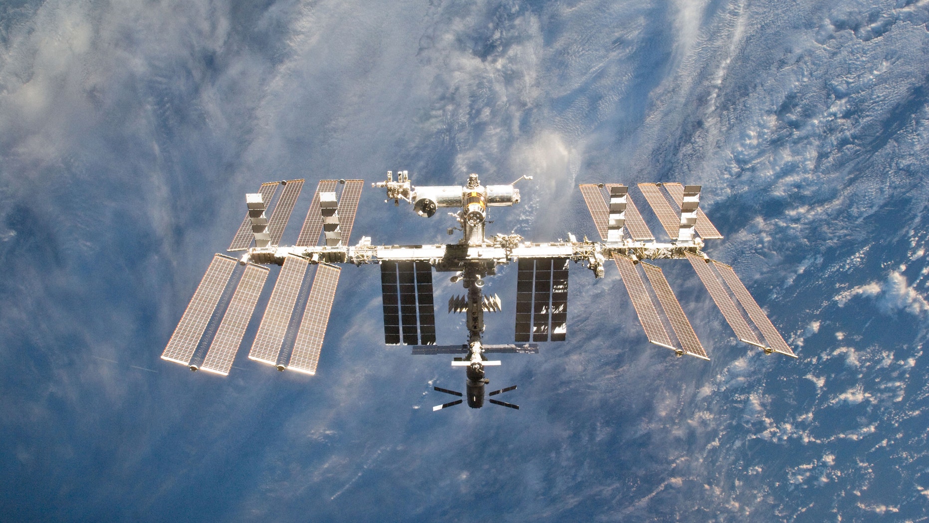 File photo - The International Space Station is seen in this view from the space shuttle Discovery after the undocking of the two spacecraft in this photo provided by NASA and taken March 7, 2011. (REUTERS/NASA/Handout)