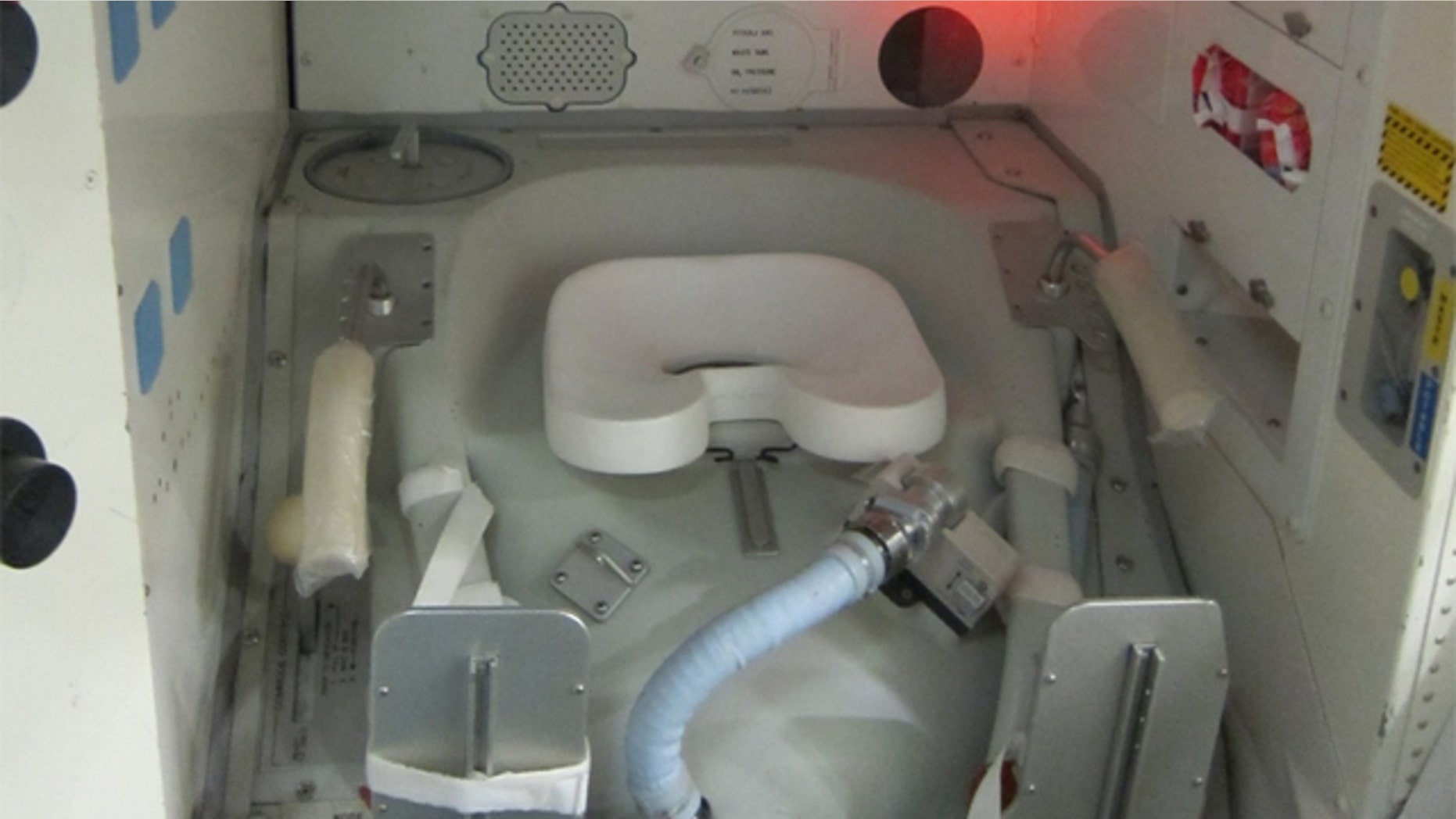 A mock-up of the bathroom on the space shuttle at Johnson Space Center in Texas.