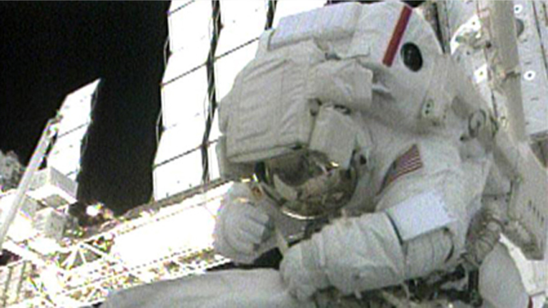 STS-130 Mission Specialist Bob Behnken works outside the International Space Station during the first spacewalk of the STS-130 mission on Feb. 10, 2010.