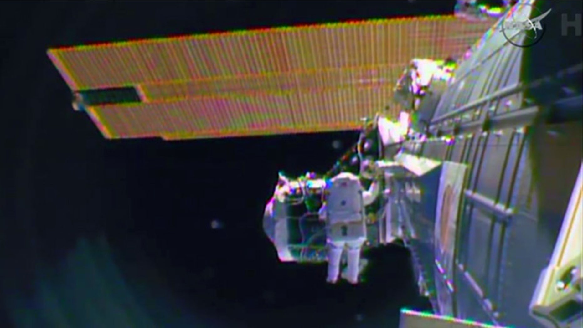 Feb. 21, 2015: In this image from television astronaut Barry "Butch" Wilmore begins the spacewalk to wire the International Space Station in preparation for the arrival in July of the international docking port for the Boeing and Space-X commercial crew vehicles.(AP)