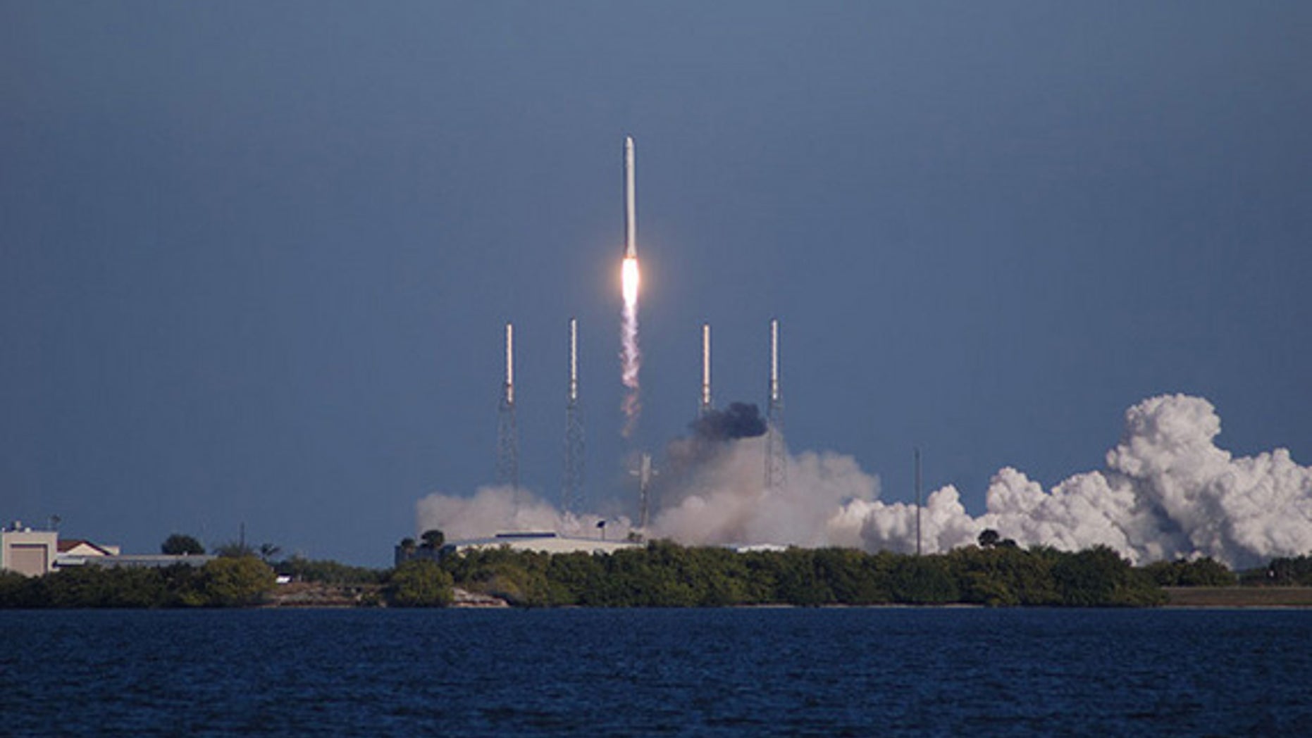 SpaceX's Falcon 9 rocket lifts off on Dec. 8, 2010, with the company's first Dragon spacecraft. Three hours and 20 minutes later, the capsule splashed down in the Pacific Ocean, marking a first for a non-governmental entity.