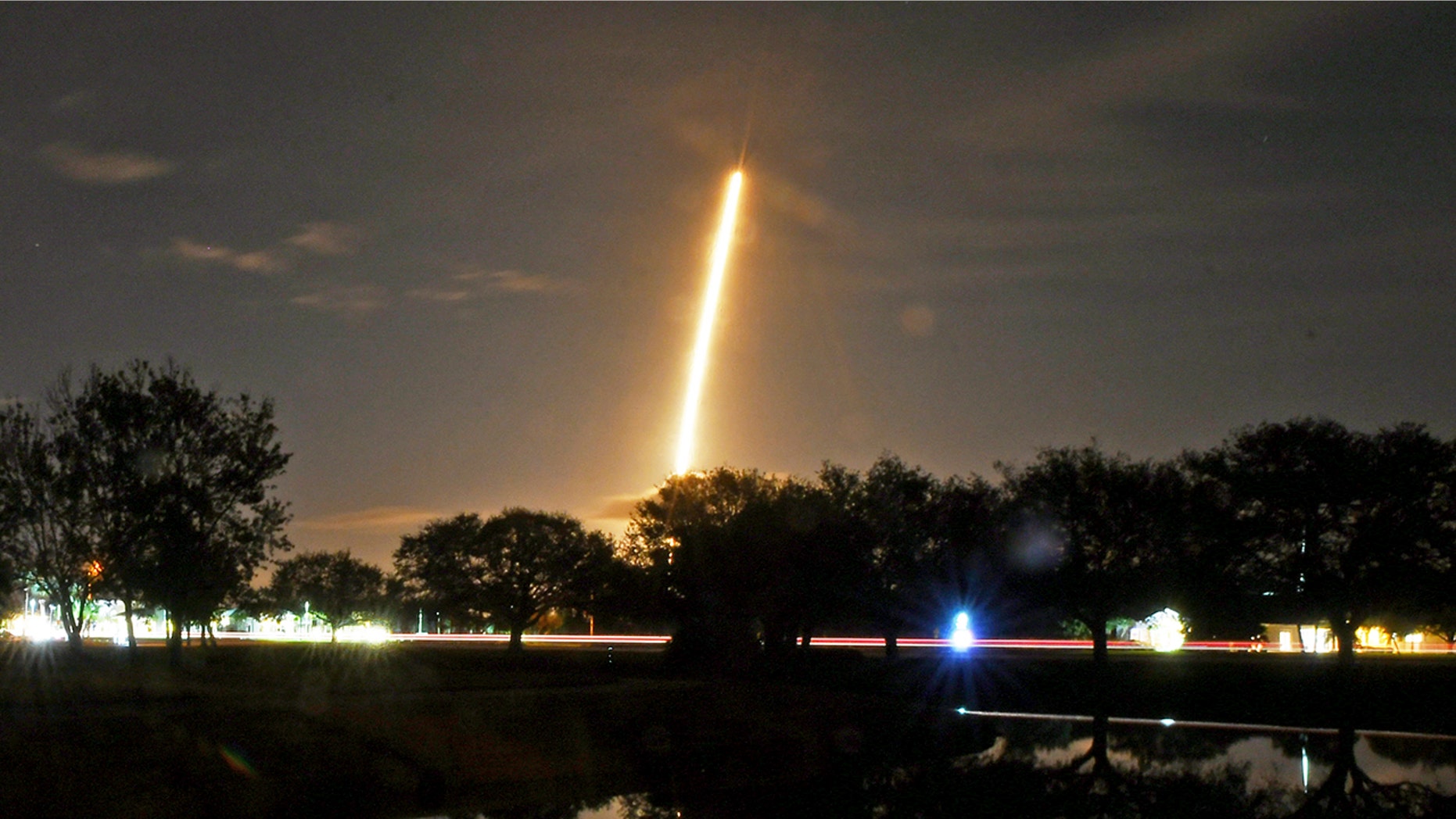 In this image made with a long exposure the SpaceX Falcon 9 rocket launches from Cape Canaveral Air Force Station.
