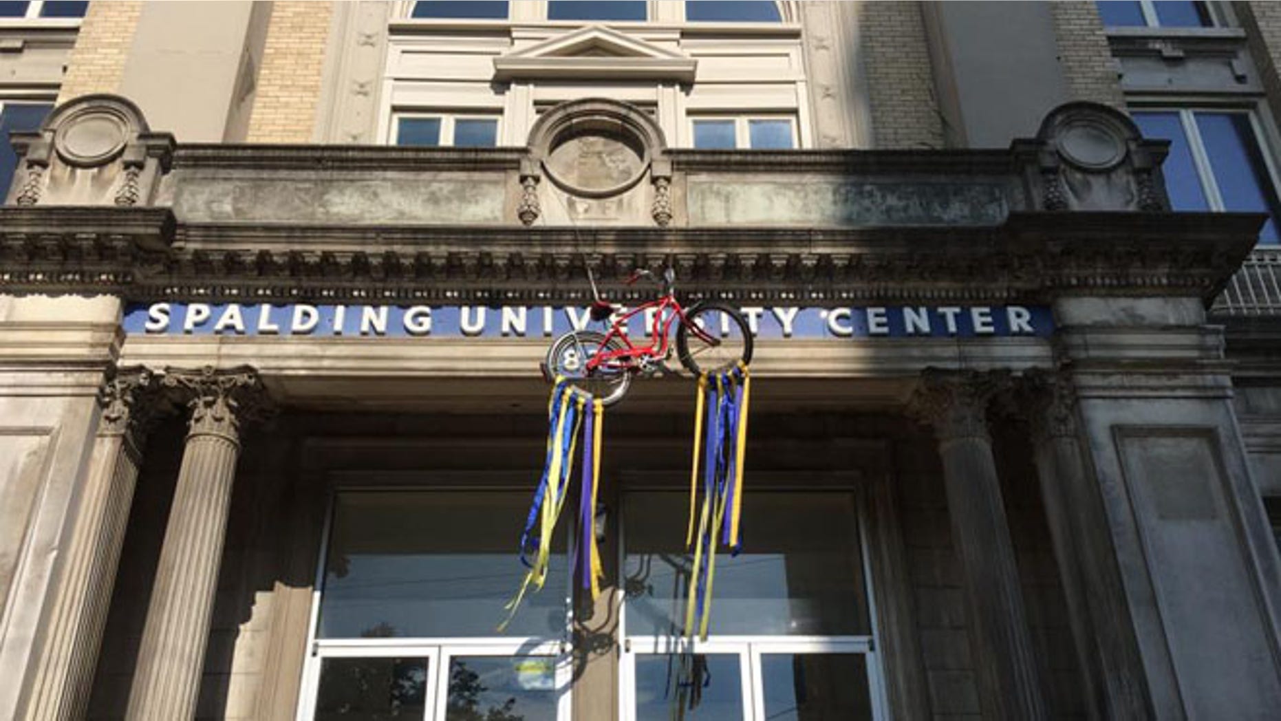 Spalding University hung a red bicycle from school's University Center to commemorate Muhammad Ali. (Spalding University)