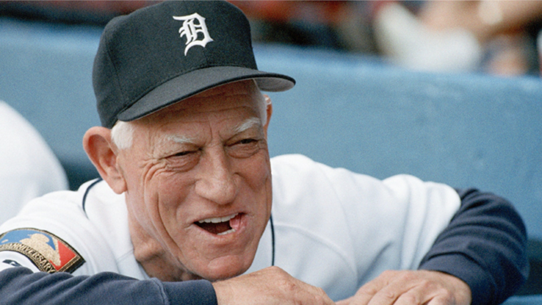 July 26, 1994: Detroit Tigers manager Sparky Anderson smiling as he looks out from the dugout prior to the start of a baseball game against the Seattle Mariners in Detroit.