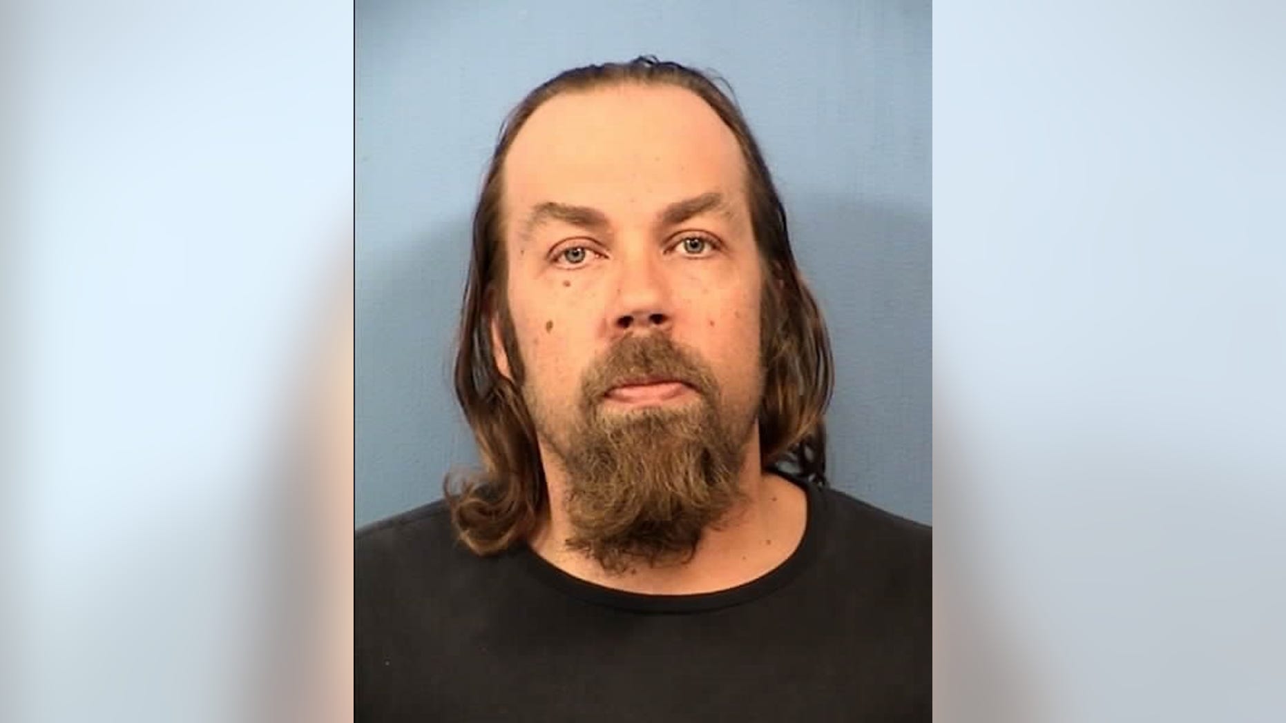Thomas Spear, 43, was charged in the 1994 killing of a 71-year-old woman.