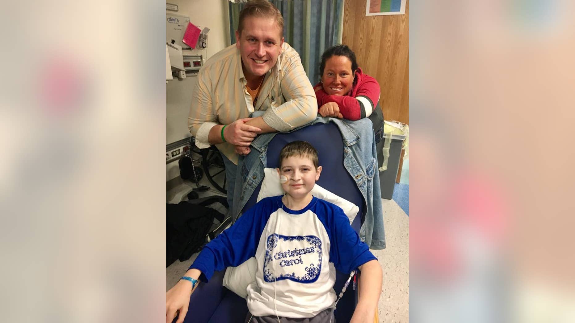 December 2016: Spencer with his dad Ken Kolman and his mom Liz Kolman at St. Louis Children’s Hospital after his transplant.