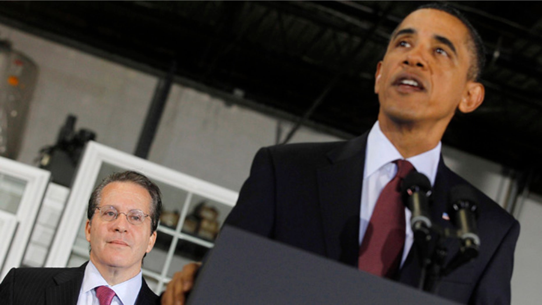 In this Jan. 7, 2011, file photo, President Obama discusses the economy alongside National Economic Council head Gene Sperling in Landover, Md.