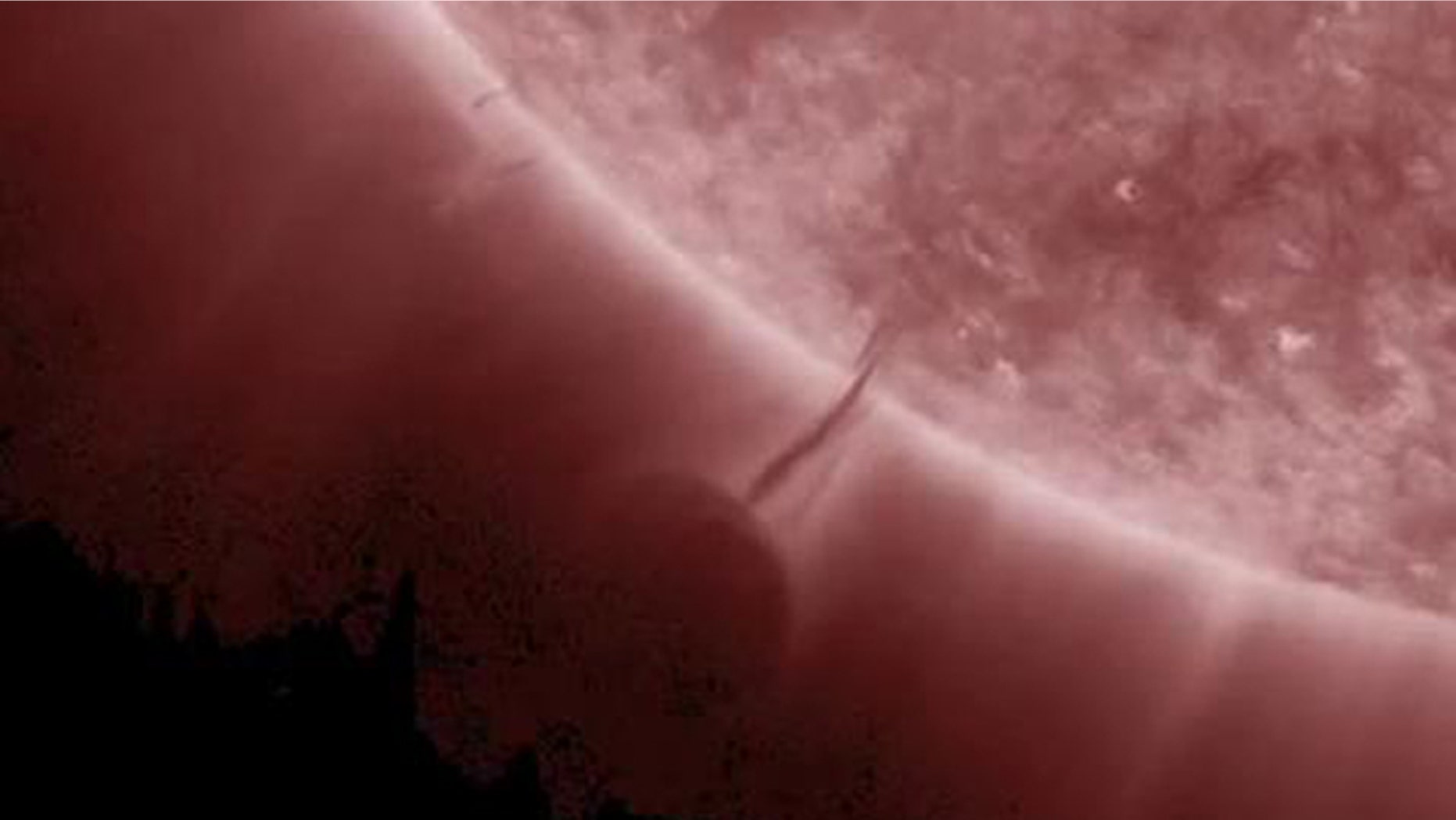A solar prominence and associated filament tunnel, photographed March 12.
