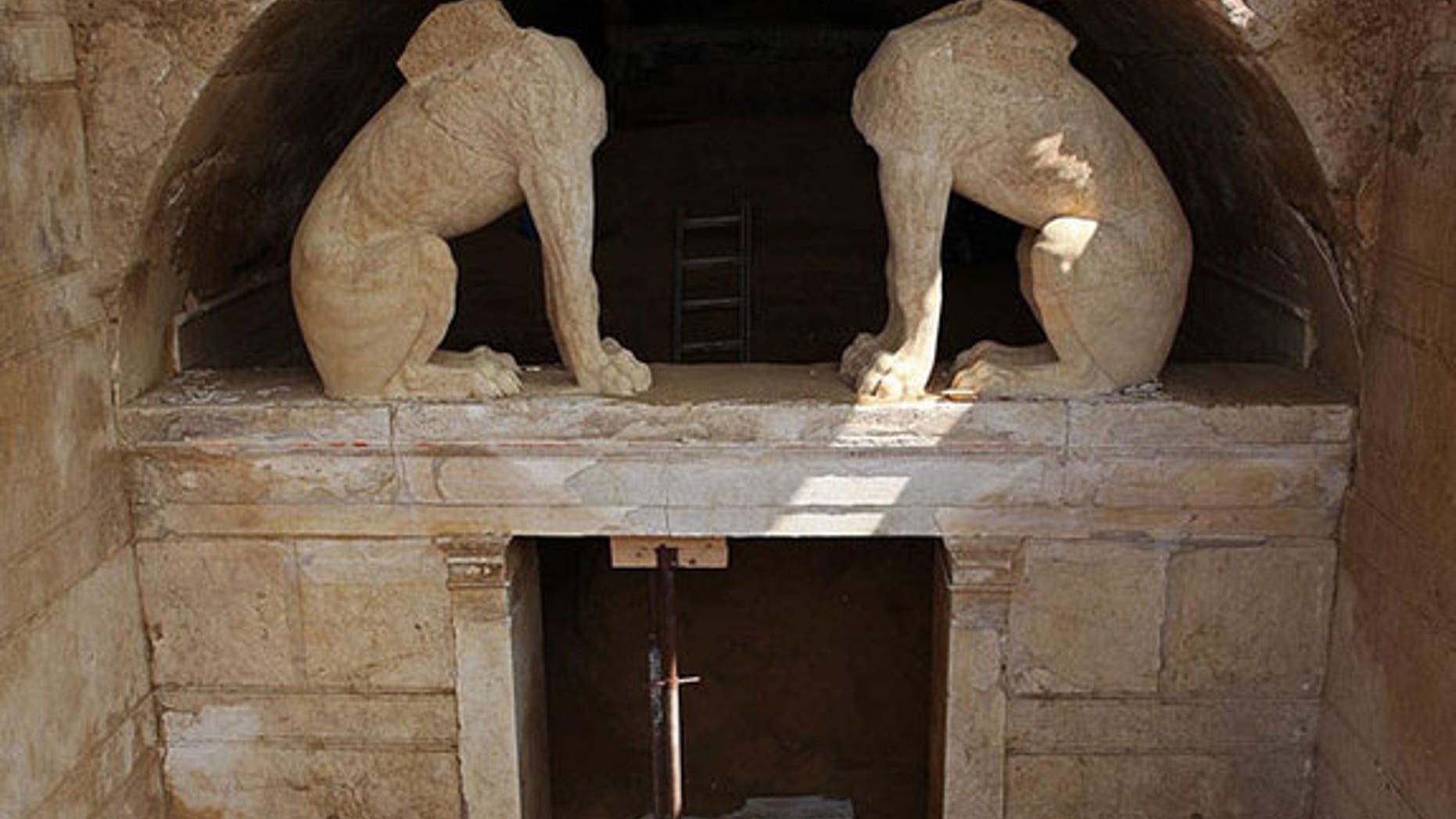Two sphinxes stand guard at a tomb more than 2,000 years old in Amphipolis. The Greek Ministry of Culture released this image on Aug. 25, 2014, showing the progress that has been made clearing dirt from the entrance.