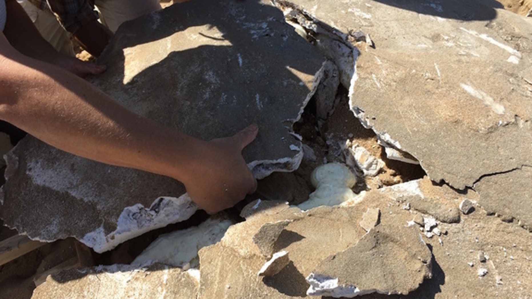 The team works to repair damage from more than nine decades in the desert.
