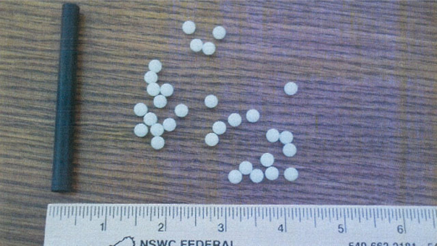 Photo acquired by Andrew Mikel from through a FOIA request with the Spotsylvania County School Board shows plastic pellets and the black plastic tube his son used to launch them at fellow students.