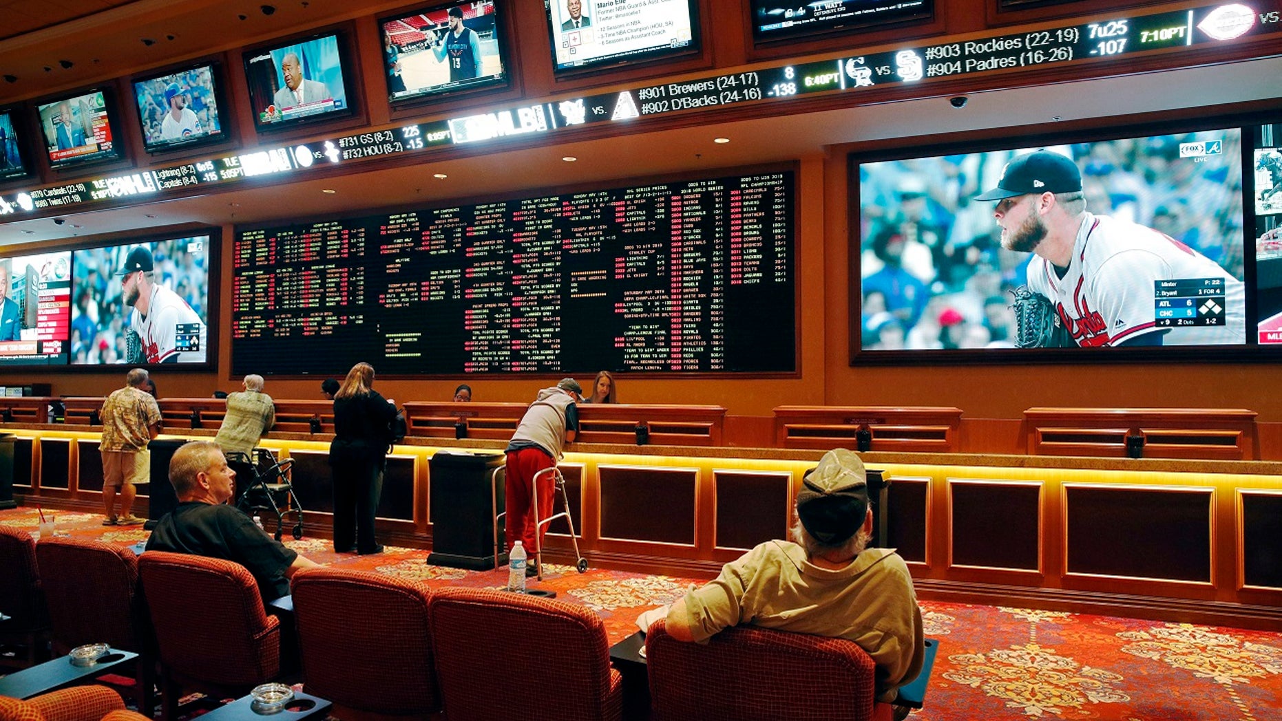 Mississippi gambling regulators approved rules on Thursday to legalize sports betting. Pictured: The South Point hotel and casino sports betting parlor in Las Vegas.