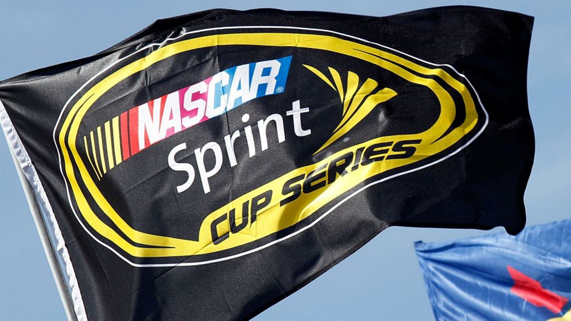 DOVER, DE - MAY 16: The NASCAR Sprint Cup Series Flag and Sunoco Flag during the NASCAR Sprint Cup Series Autism Speaks 400 at Dover International Speedway on May 16, 2010 in Dover, Delaware. (Photo by Jason Smith/Getty Images for NASCAR)