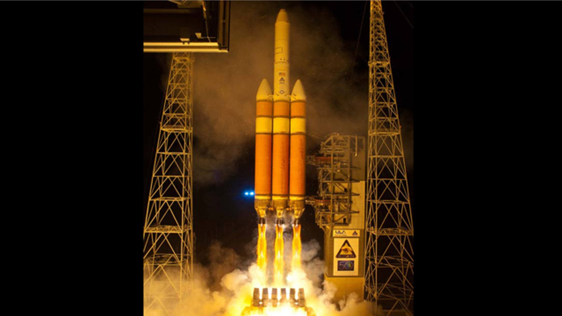 A United Launch Alliance Delta 4 Heavy launches with a National Reconnaissance Office payload NROL-32 from Space Launch Complex-37 at 5:58 p.m. EST (2258 GMT).