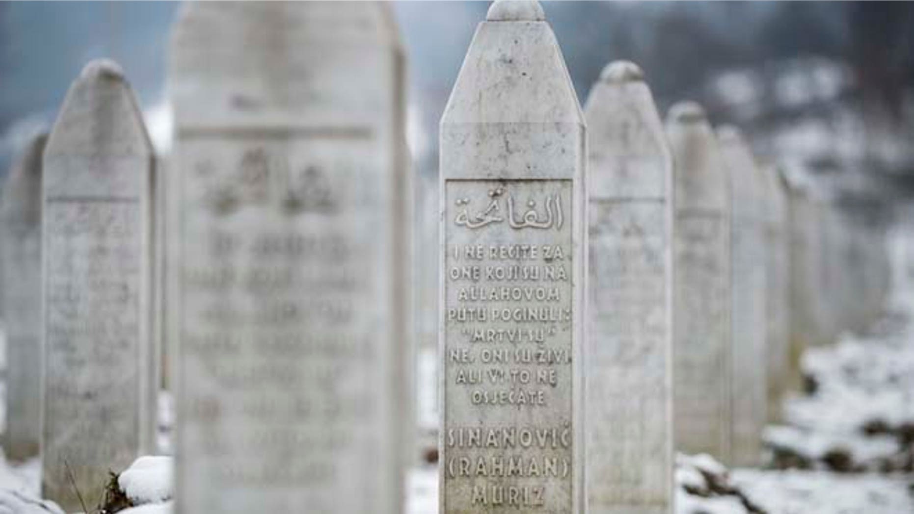 Saturday, March 7, 2015: This photo taken in the memorial cemetery Potocari, outside Srebrenica, shows the gravestone of Muriz Sinanovic. Sinanovic was among the 8,000 Muslim Bosniak men and boys killed in July 1995 Srebrenica massacre.