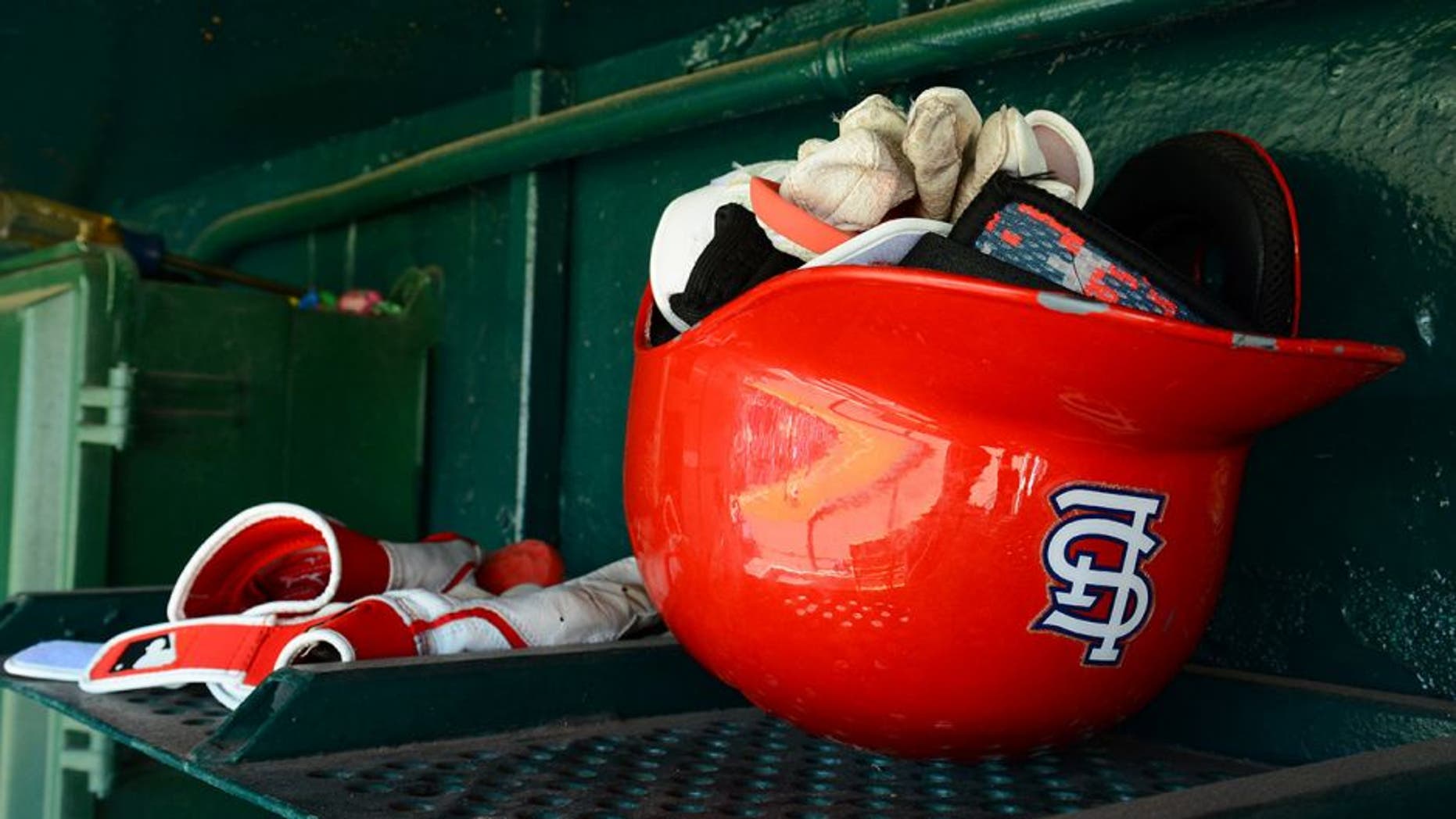 LAKELAND, FL - MARCH 03: A detailed view of a St. Louis Cardinals batting helmet sitting in the dugout prior to the spring training game against the Detroit Tigers at Joker Marchant Stadium on March 3, 2014 in Lakeland, Florida. The Tigers defeated the Cardinals 8-5. (Photo by Mark Cunningham/MLB Photos via Getty Images)