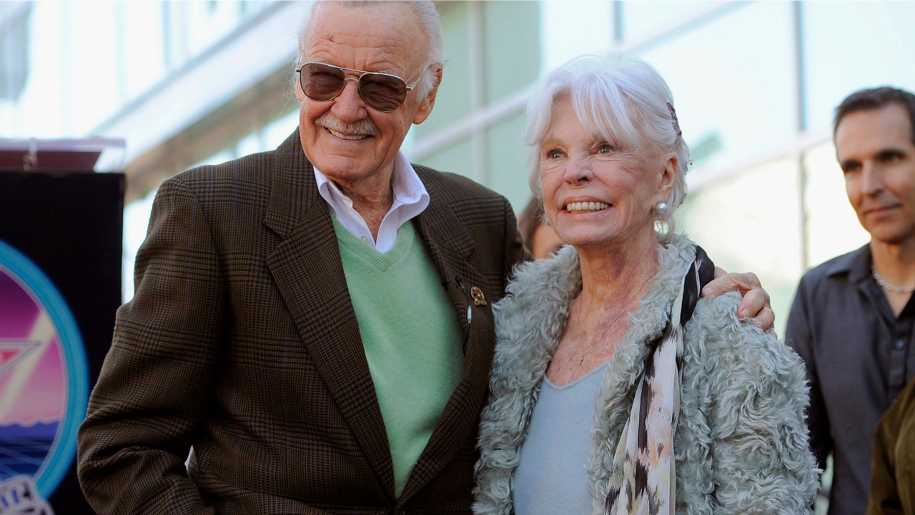 Comic book creator Stan Lee poses with his wife Joan after he received a star on the Hollywood Walk of Fame in Los Angeles in January 2011.