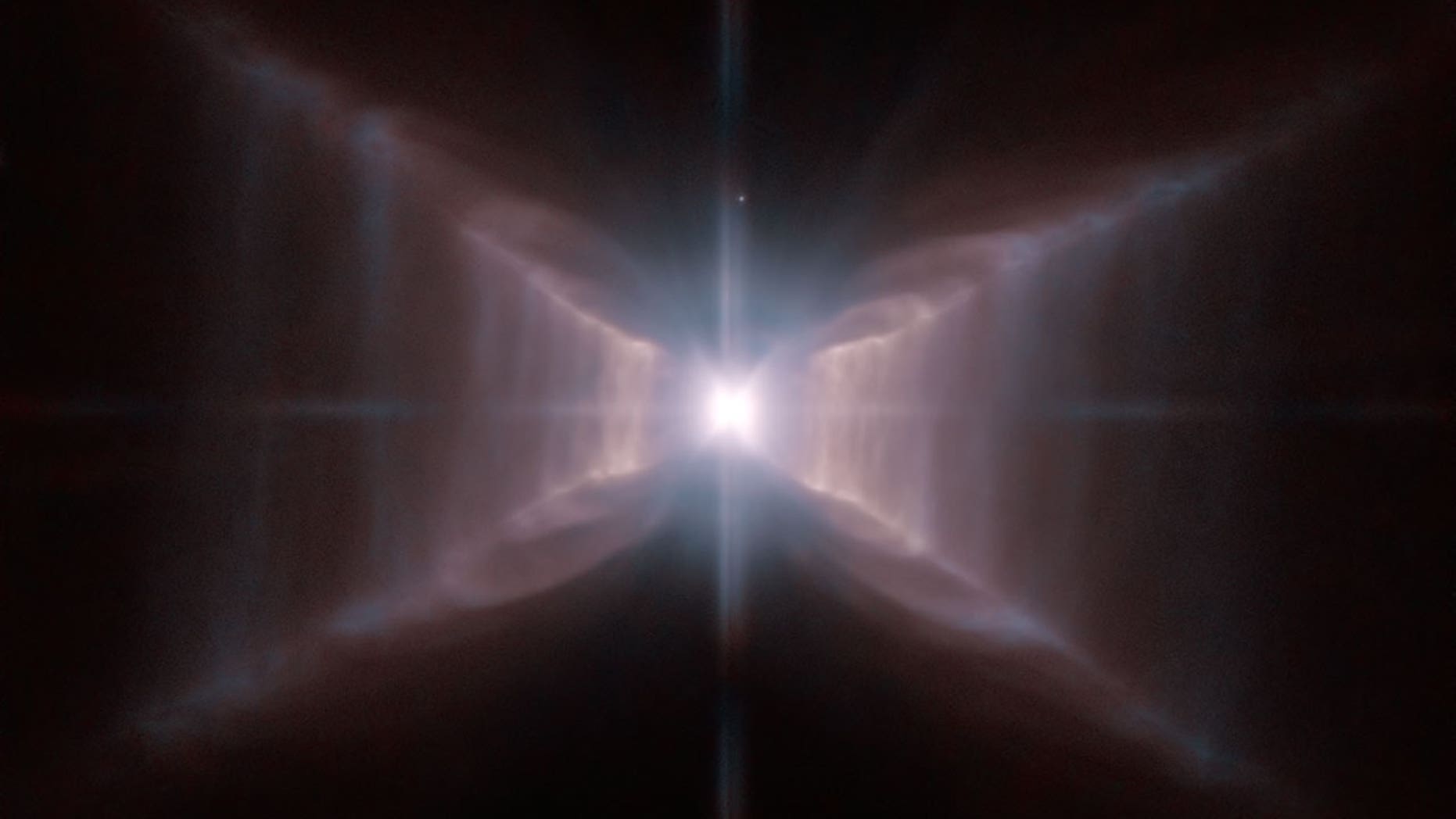 An image of star HD 44179, surrounded by an extraordinary structure known as the Red Rectangle. This image was captured by the Hubble Space Telescope.