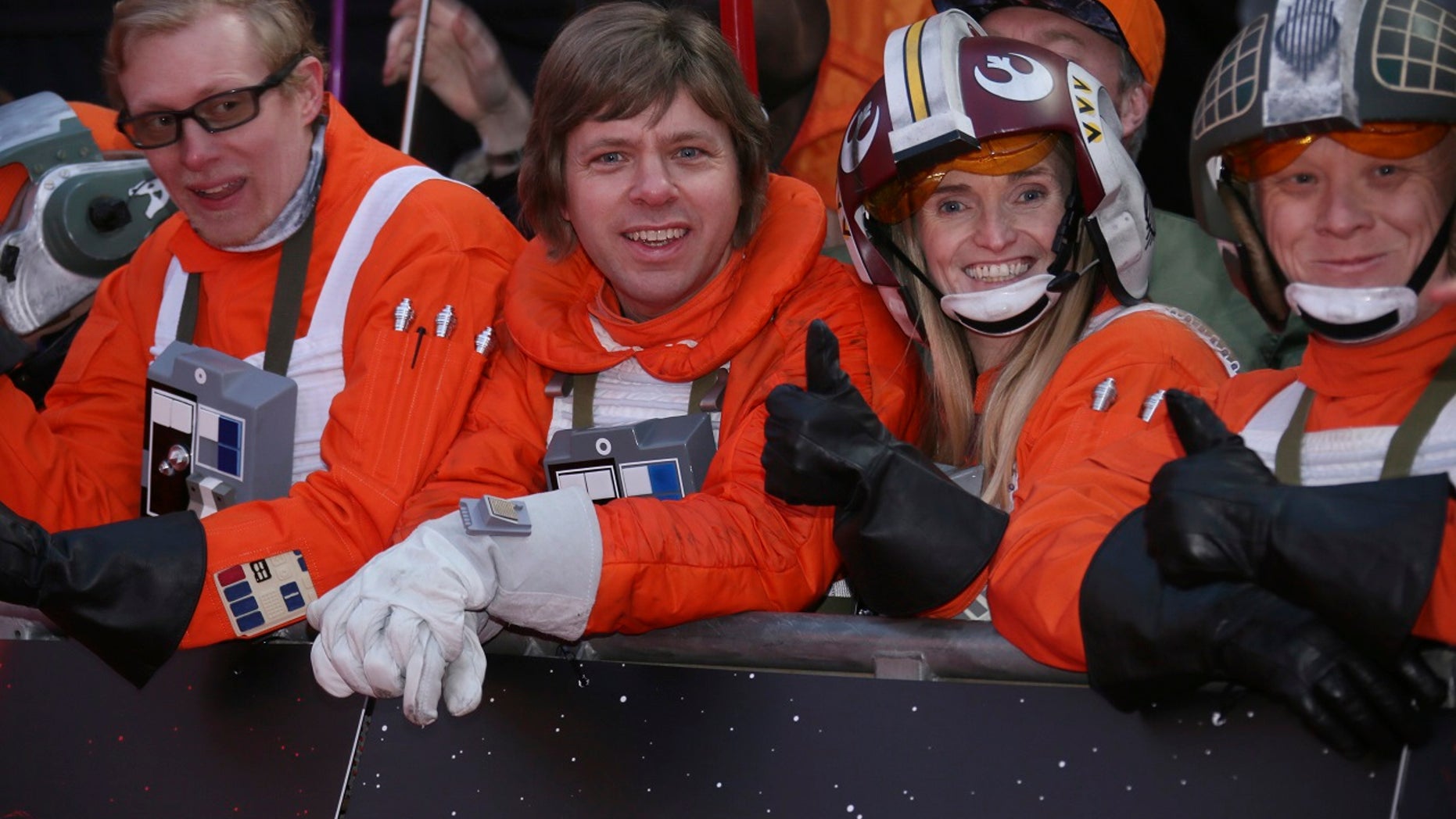"Star Wars" fans gather at the film's premiere in London on Tuesday, and soon astronauts get to watch it in space.