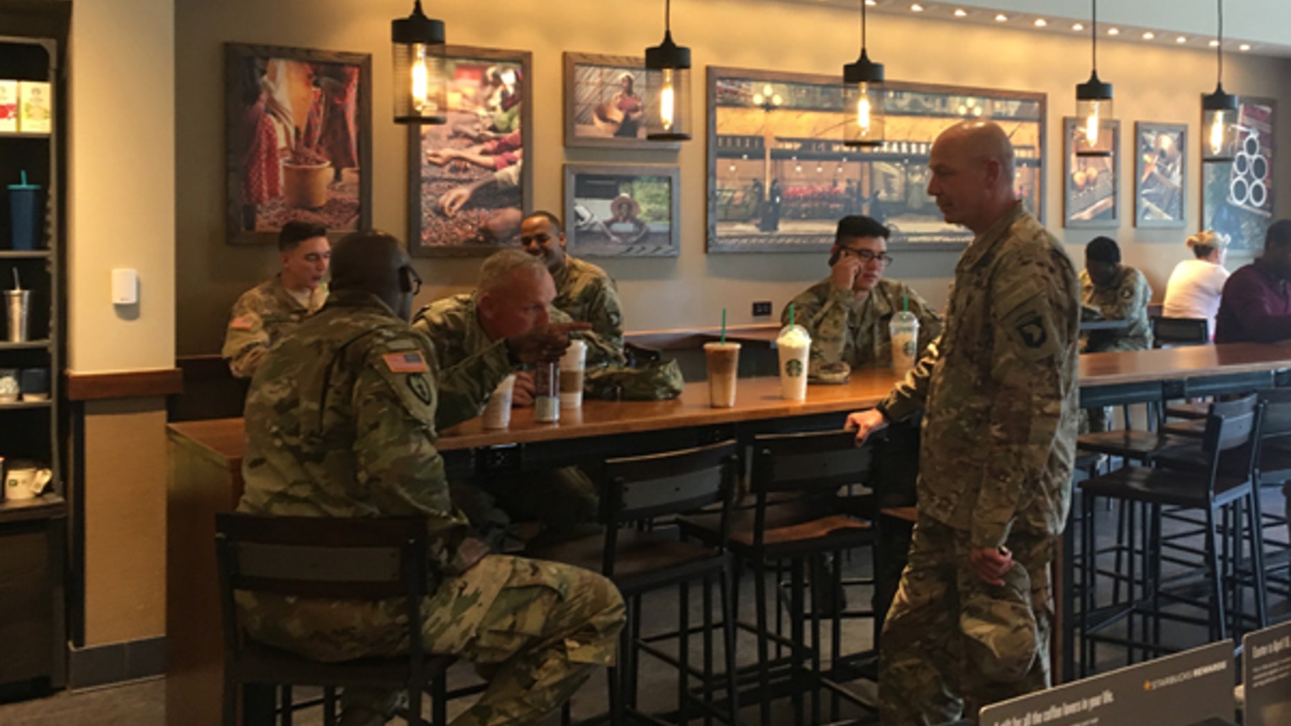 April 24, 2017: Active military personnel from Fort Campbell gather at one of Starbucks' new "Military Family Stores" in Clarksville, Tenn.