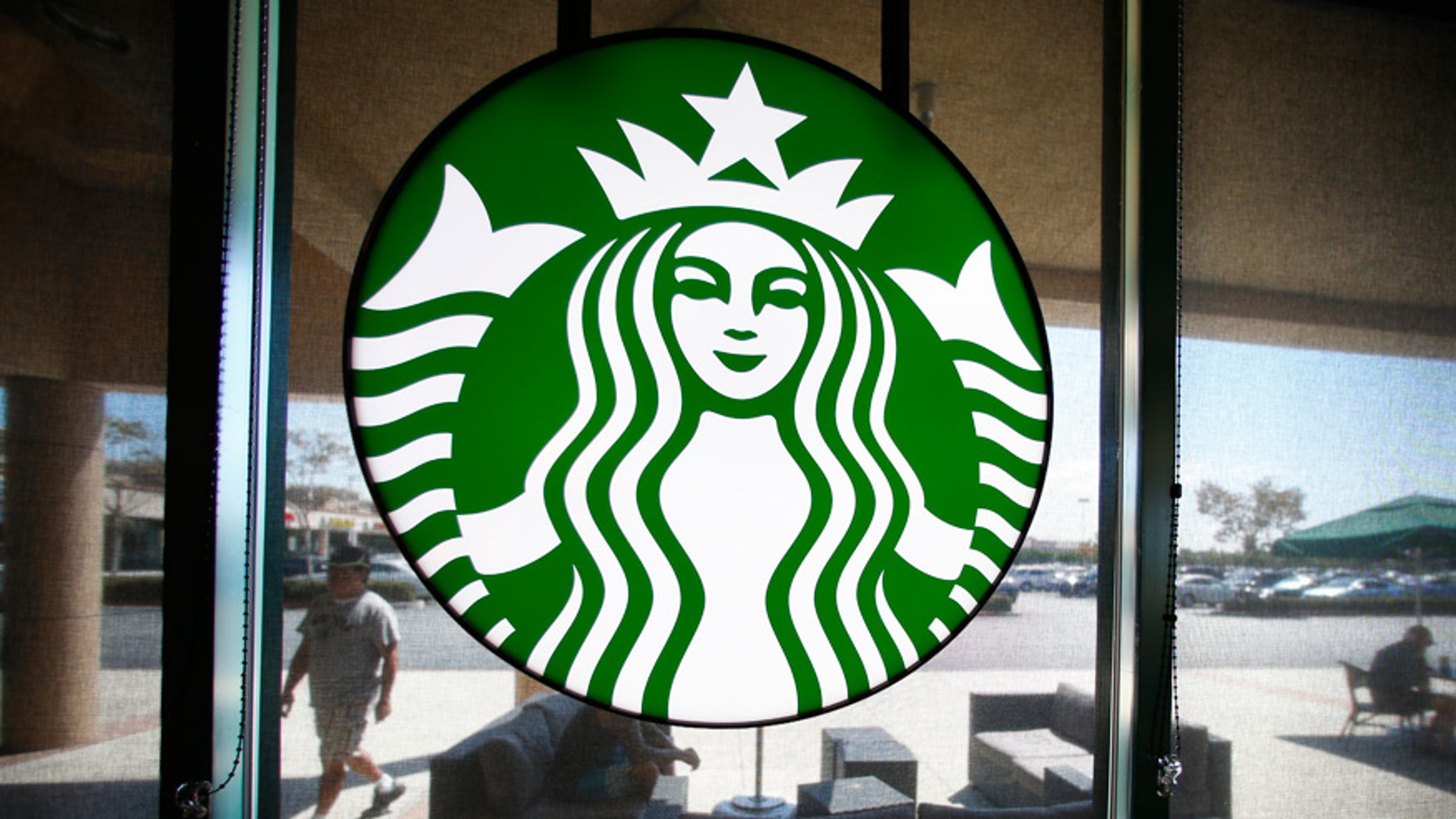 The company behind Simon malls isn't too happy with Starbucks.