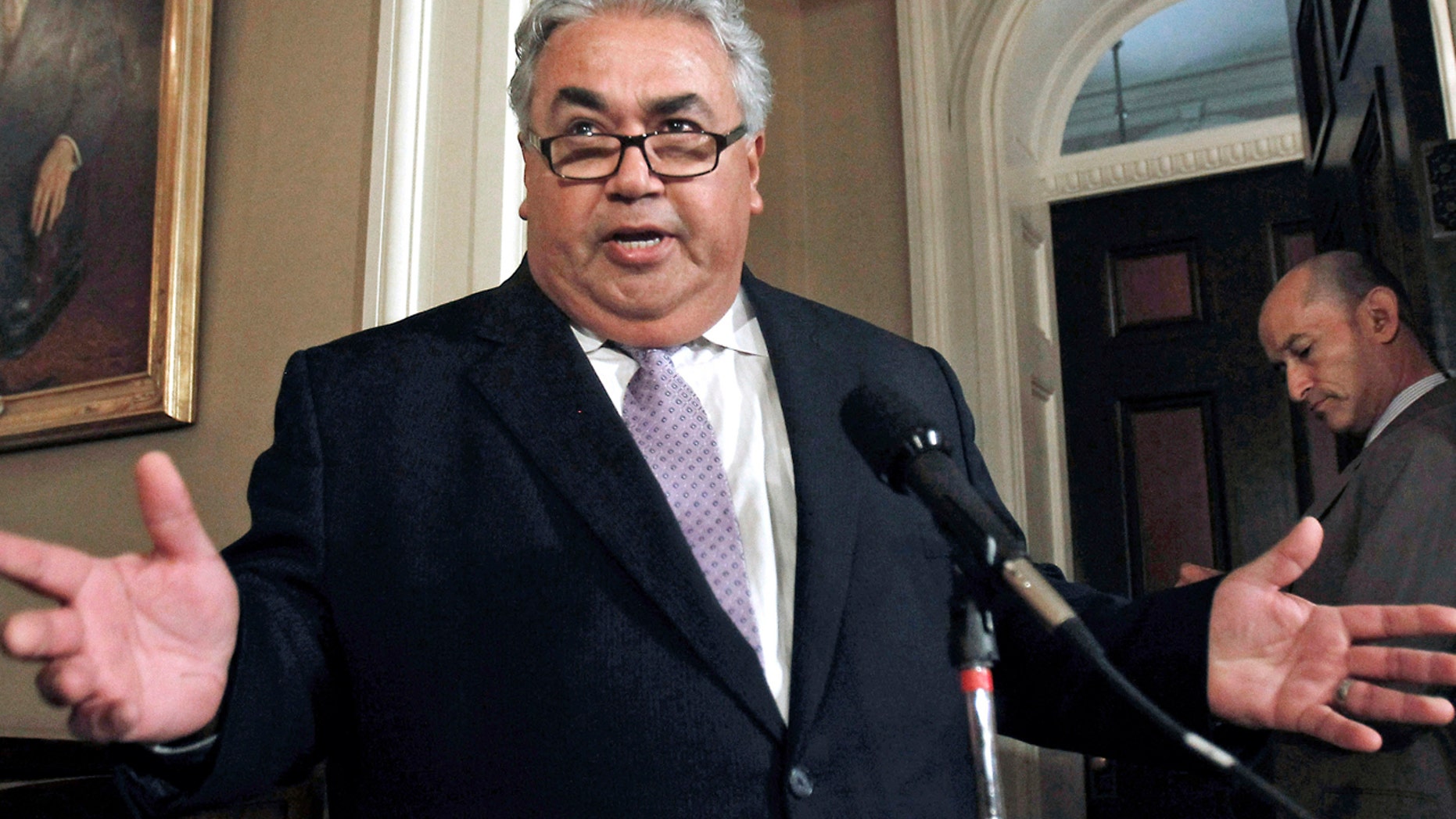FILE - In this June 10, 2013 file photo, then-California State Sen. Ron Calderon, D-Montebello, discusses the FBI raid on his Capitol office in Sacramento.