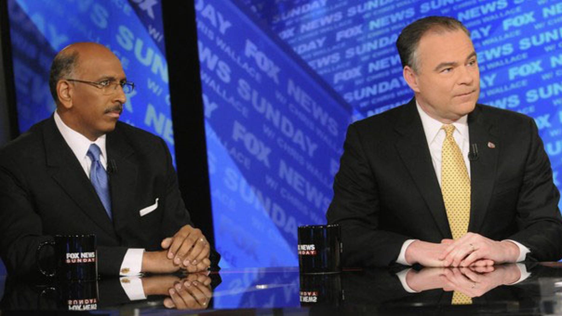 Republican National Committee Chairman Michael Steele, left, and Democratic National Committee Chairman Tim Kaine appear on 'Fox News Sunday' in Washington Jan. 10. (Reuters Photo)