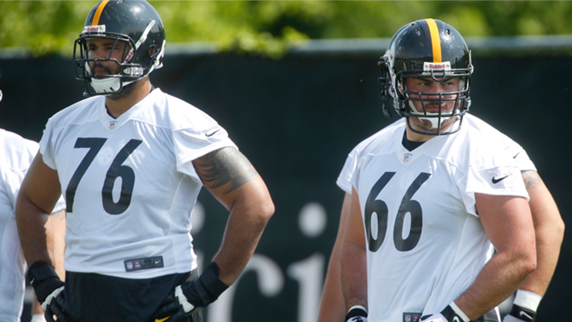 Pittsburgh Steelers offensive tackle Mike Adams (76) and guard David DeCastro (66) wait for the next drill during NFL football practice on Thursday, May 30, 2013 in Pittsburgh.