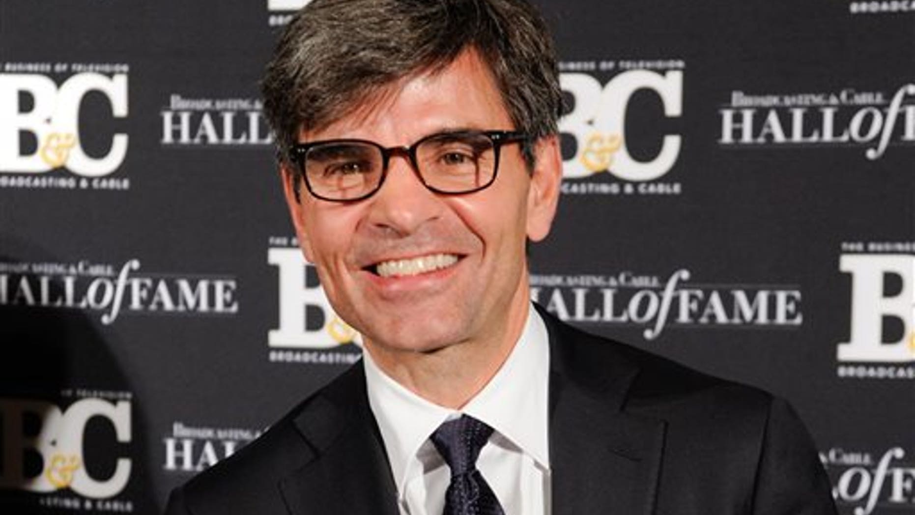 FILE - This Oct. 20, 2014 file photo shows George Stephanopoulos at the 24th Annual Broadcasting and Cable Hall of Fame Awards in New York. Stephanopoulos has apologized for not notifying his employer and viewers about two contributions totaling $50,000 that he made to the Clinton Foundation. ABC's news division said Thursday, May 15, 2015, that "we stand behind him." The donations, made in two installments in 2013 and 2014 and first reported in Politico, were made because of Stephanopoulos' interest in the foundation's work on global AIDS prevention and deforestation, he said. (Photo by Evan Agostini/Invision/AP, File)