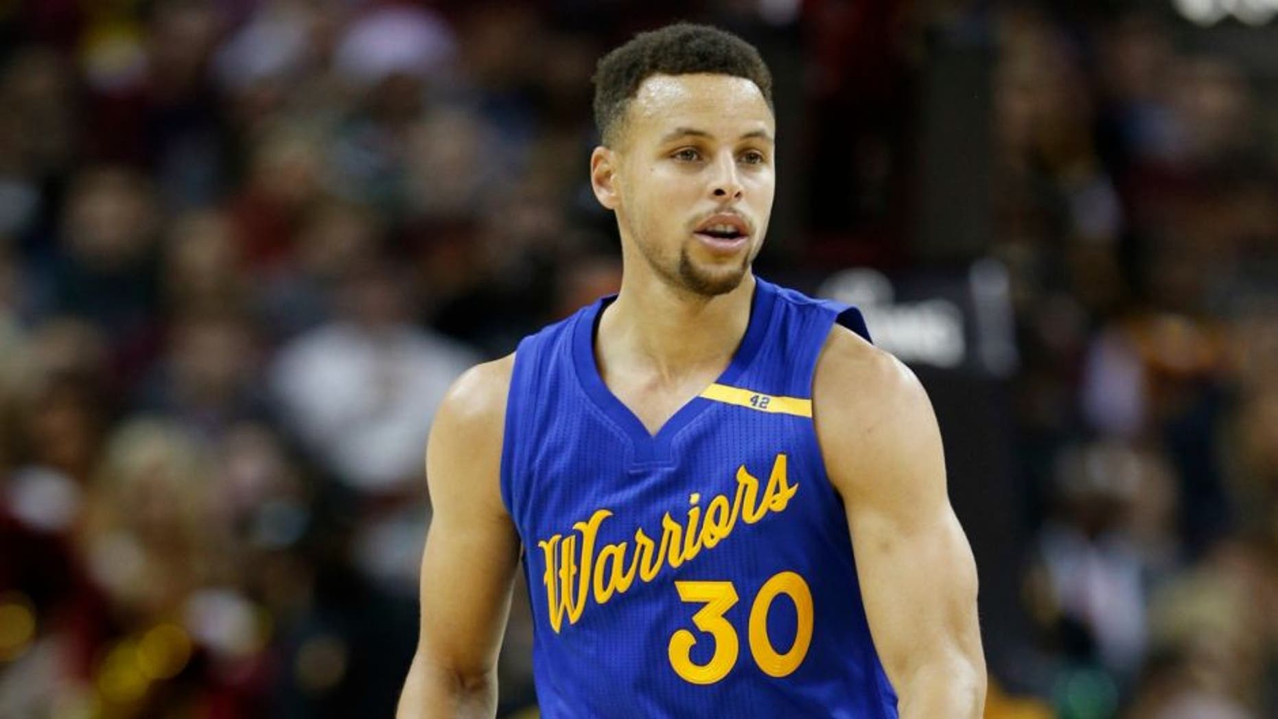 Dec 25, 2016; Cleveland, OH, USA; Golden State Warriors guard Stephen Curry (30) brings the ball up court against the Cleveland Cavaliers at Quicken Loans Arena. Cleveland defeats Golden State 109-108. Mandatory Credit: Brian Spurlock-USA TODAY Sports