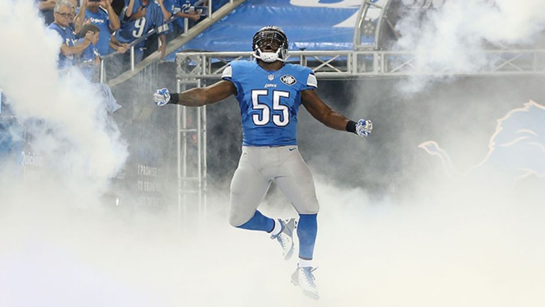 DETROIT, MI - SEPTEMBER 21: Stephen Tulloch # 55 of the Detroit Lions runs onto the field during player introductions prior to the start of the game against the Green Bay Packers at Ford Field on September 21, 2014 in Detroit, Michigan. The Lions defeated the Packers 19-7. (Photo by Leon Halip/Getty Images) *** Local Caption *** Stephen Tulloch