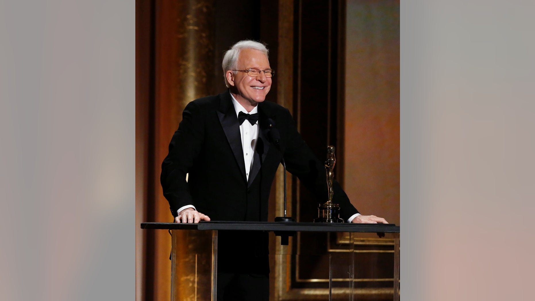 November 16, 2013. Actor Steve Martin smiles as he accepts an Honorary Award at the 5th Annual Academy of Motion Picture Arts and Sciences Governors Awards at The Ray Dolby Ballroom in Hollywood, California.