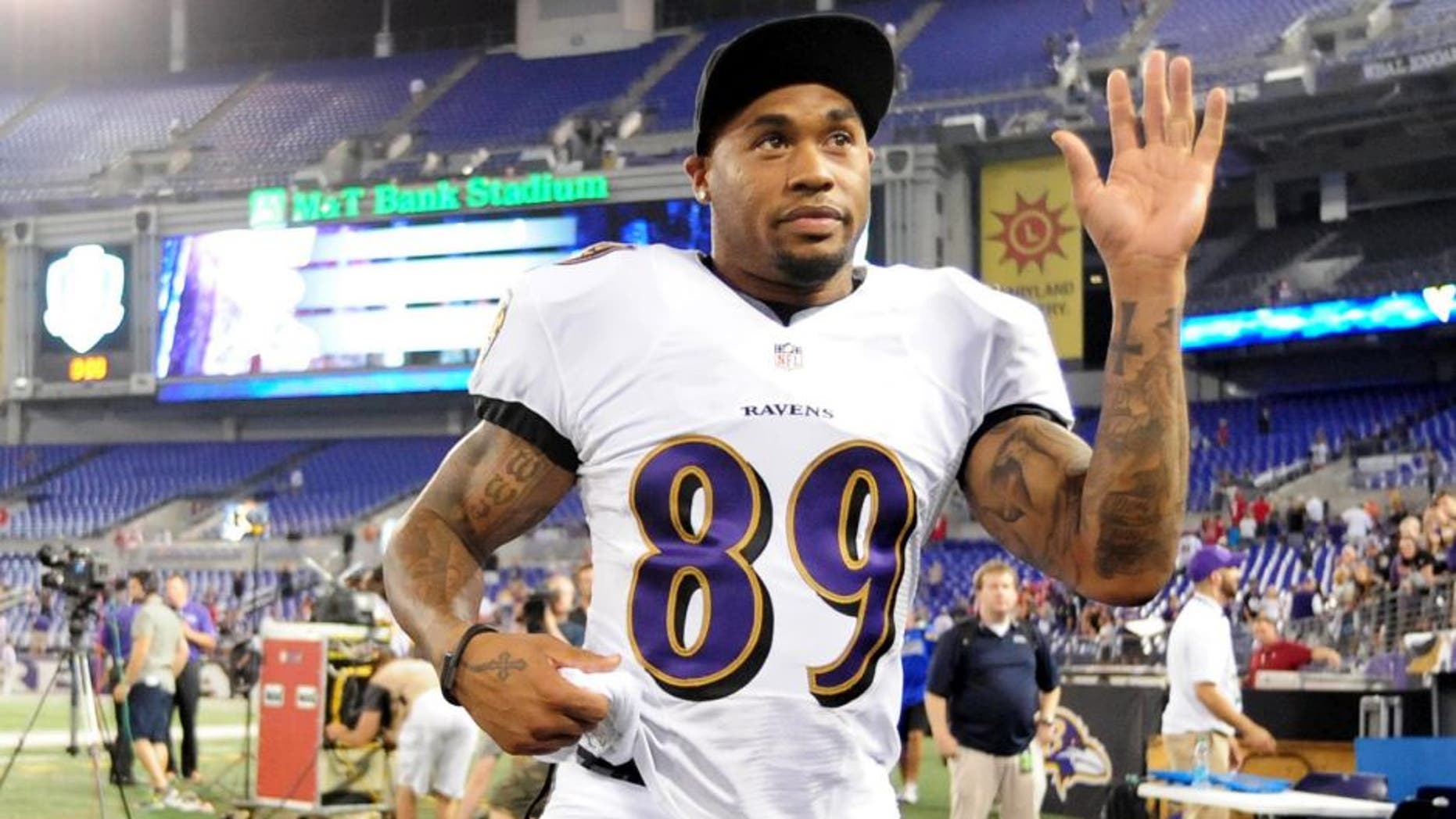 Aug 7, 2014; Baltimore, MD, USA; Baltimore Ravens wide receiver Steve Smith, Sr. (89) waves to fans after beating the San Francisco 49ers 23-3 at M&T Bank Stadium. Mandatory Credit: Evan Habeeb-USA TODAY Sports