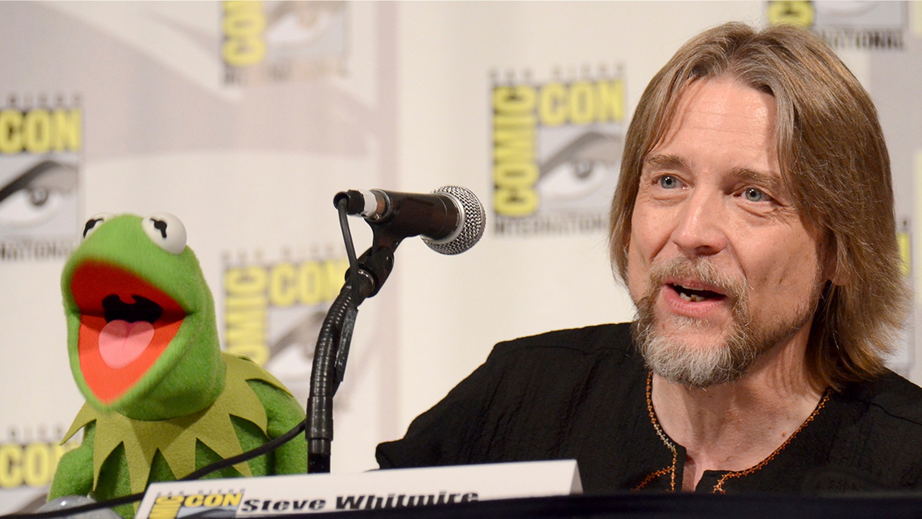 In this July 11, 2015, file photo, Kermit the Frog, left, and puppeteer Steve Whitmire attend "The Muppets" panel on day 3 of Comic-Con International in San Diego. ABC News and The Hollywood Reporter reported July 10, 2017, that Whitmire is no longer performing the character.