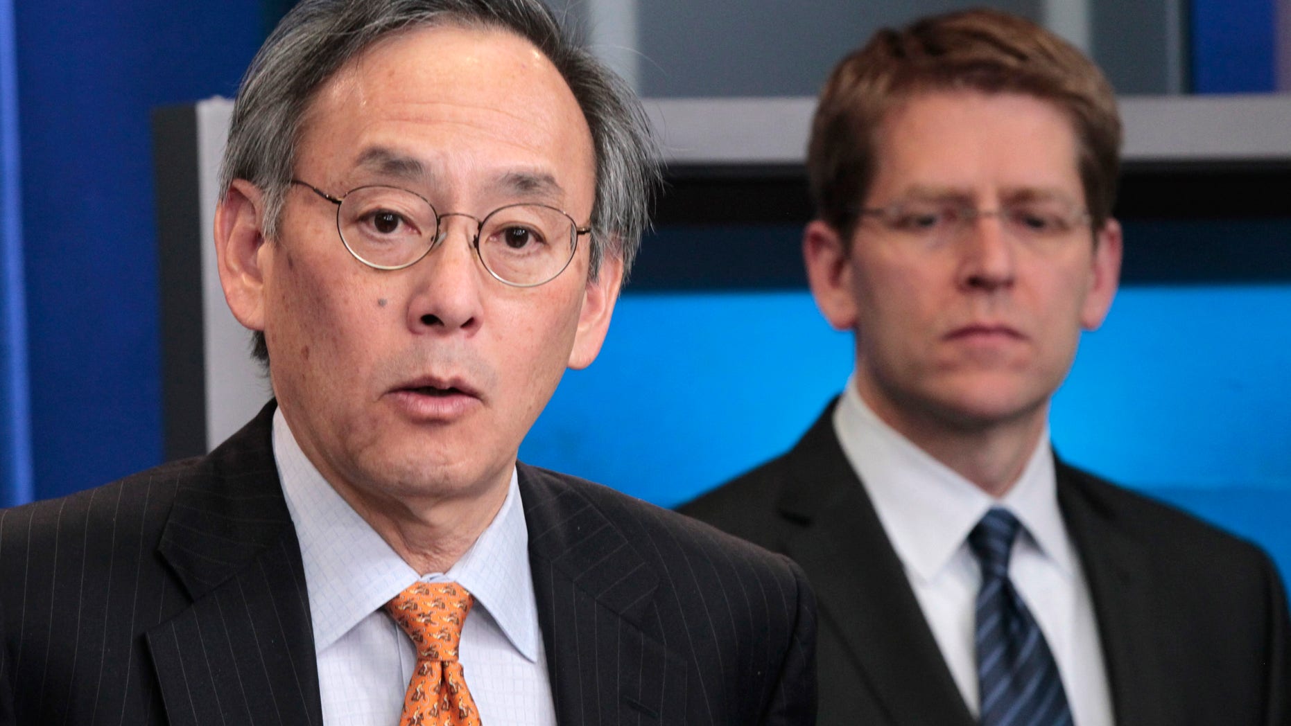FILE: In this March, 30, 2011, photo, Energy Secretary Steven Chu, left, accompanied by White House Press Secretary Jay Carney, speaks during the daily news briefing at the White House in Washington.