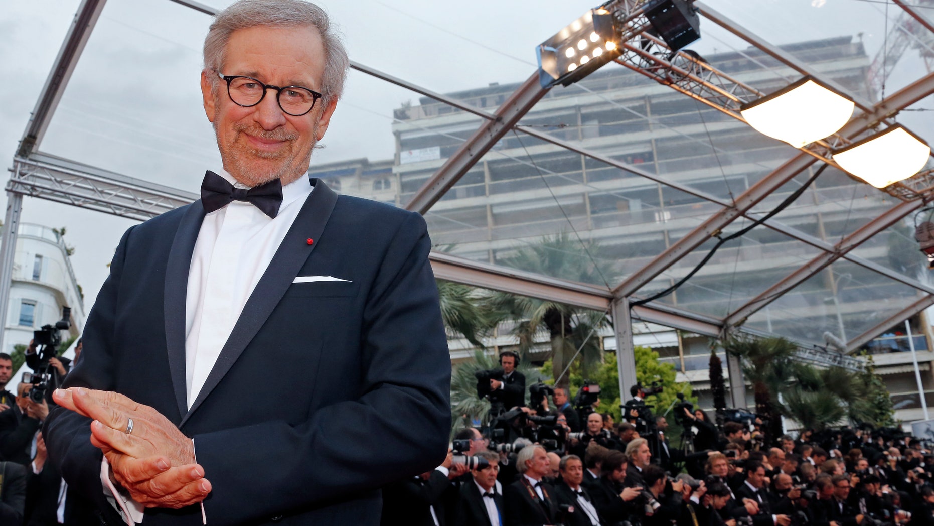 May 19, 2013. Director Steven Spielberg, Jury President of the 66th Cannes Film Festival, poses on the red carpet as he arrives for the screening of the film "Inside Llewyn Davis" in competition during the 66th Cannes Film Festival in Cannes.