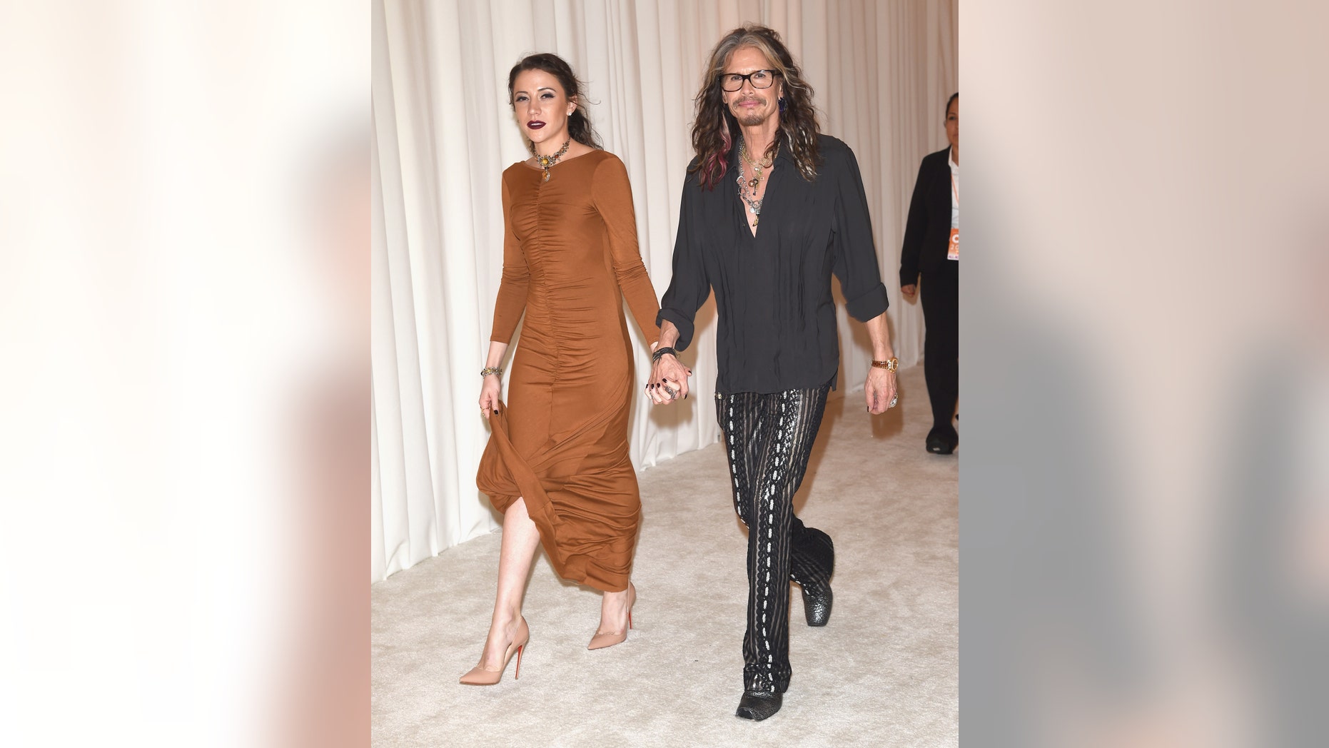 February 28, 2016. Singer Steven Tyler (R) and Aimee Ann Preston attend Bulgari at the 24th Annual Elton John AIDS Foundation's Oscar Viewing Party.