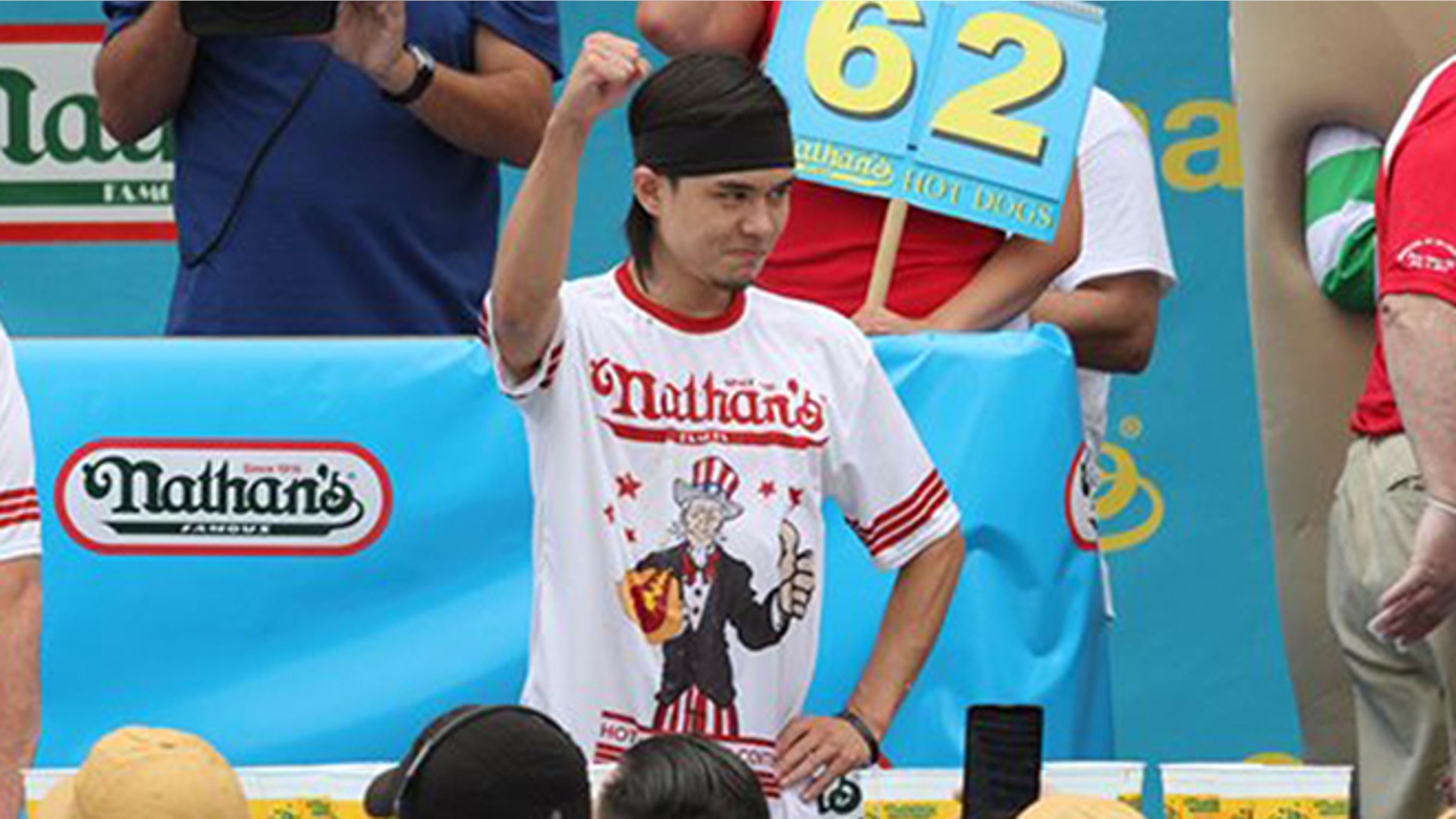 Matt Stonie gestures after winning Nathan's Famous Fourth of July International Hot Dog Eating Contest men's competition Saturday July 4, 2015 in the Coney Island section in the Brooklyn borough of New York. (AP Photo/Tina Fineberg)