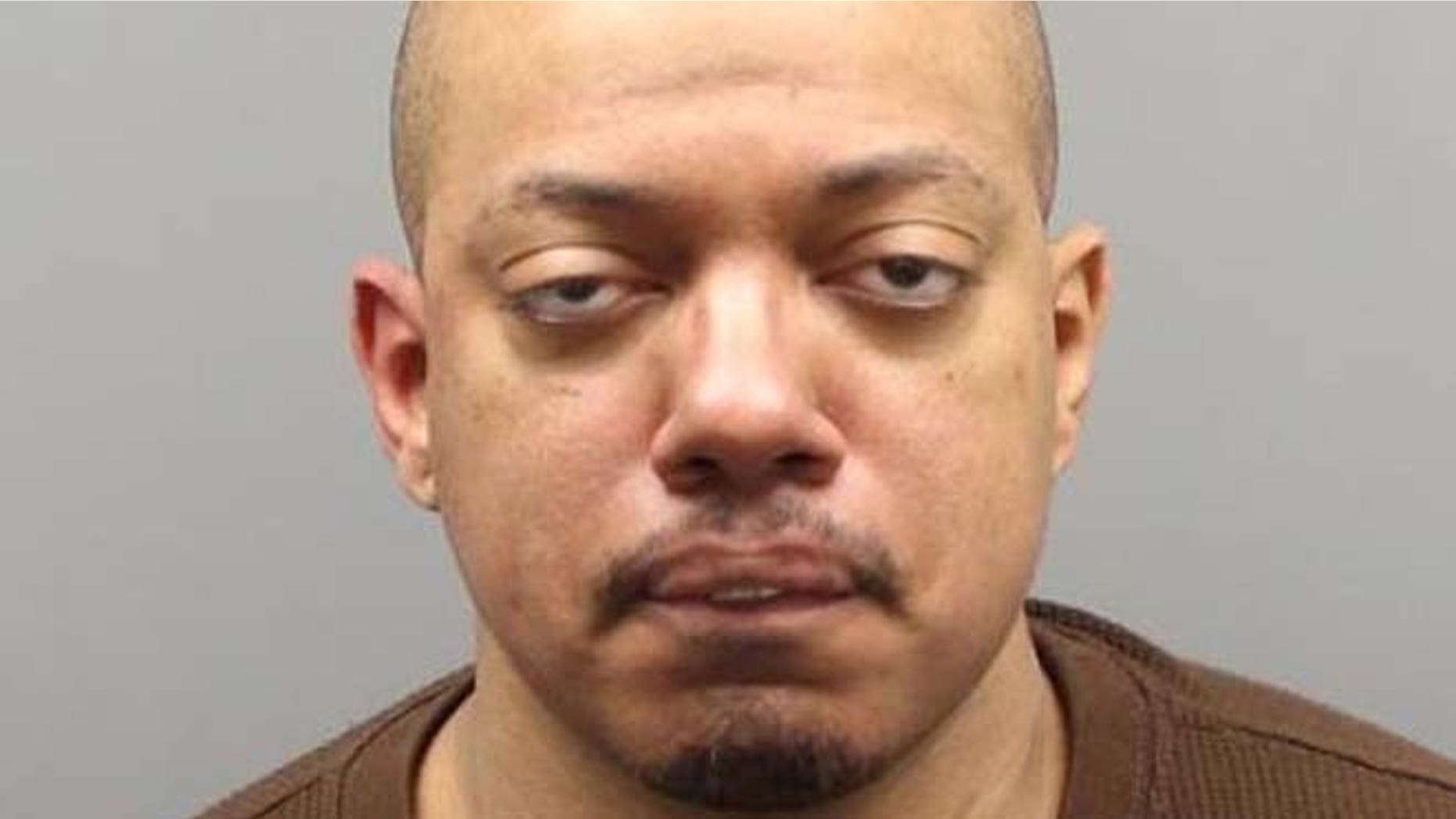 Terrence Lavaron Thomas, 39, allegedly stabbed a 52-year-old Detroit man five times and another 51-year-old Detroit man who tried to intervene during the first stabbing