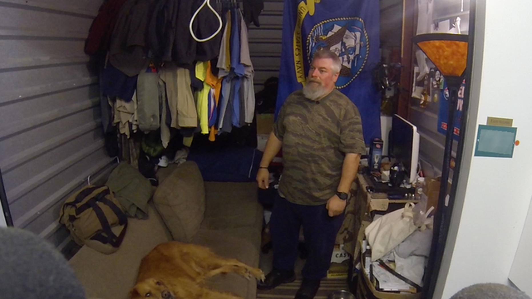 Chris Cline inside the storage unit he calls home.